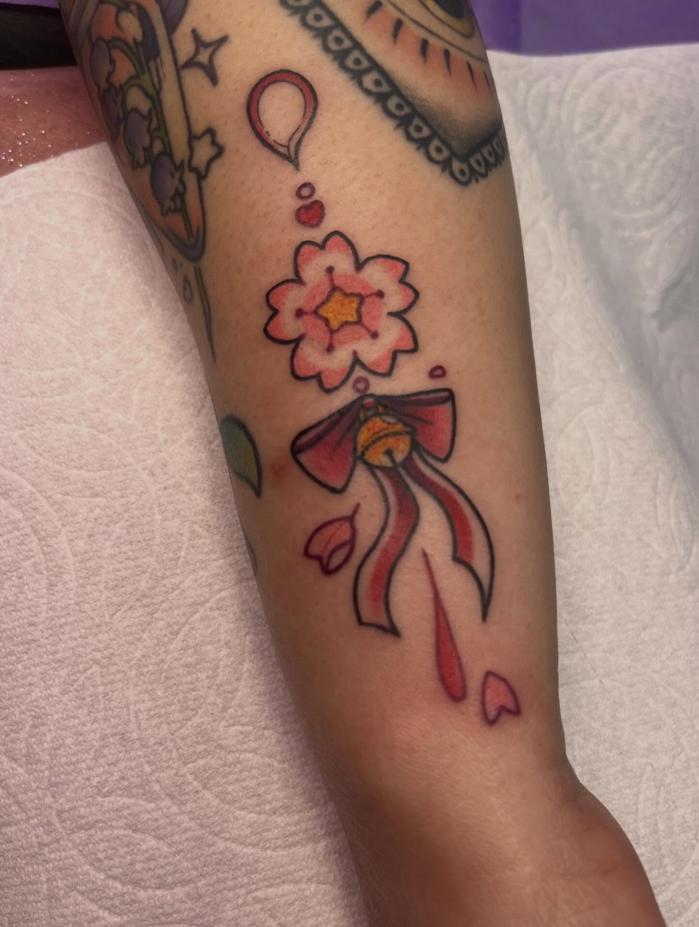 Cherry blossom and ribbon American traditional tattoo on the forearm by tacho ☻ 張玉玲