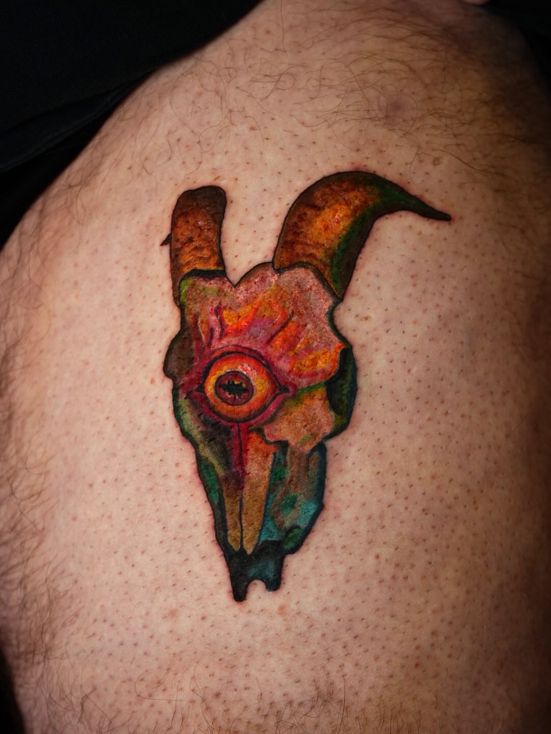 Tattoo by @rayvin_tattoos — watercolor