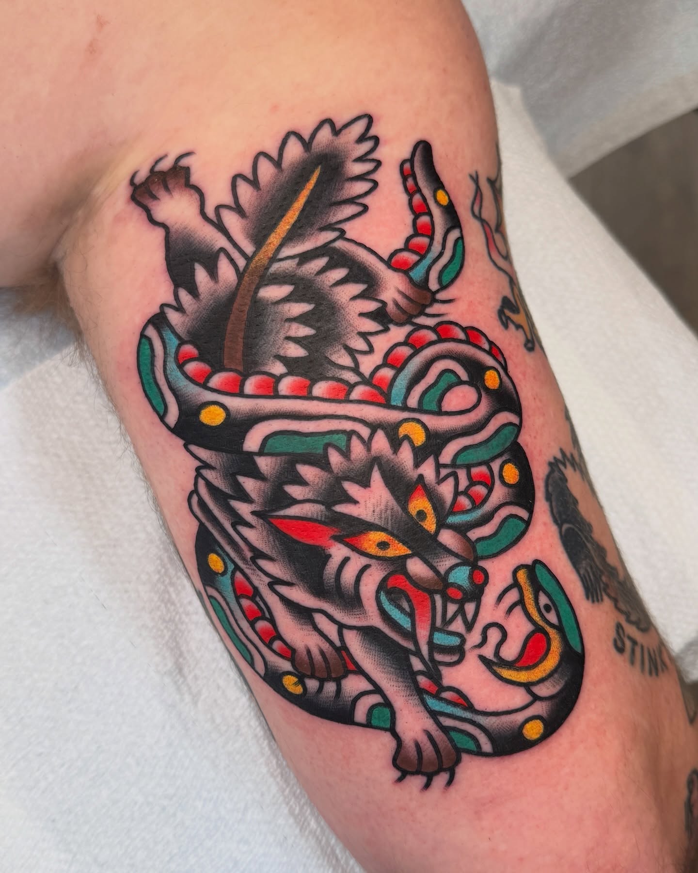 Dragon American traditional tattoo on the thigh by Cullen Bleser Quinn