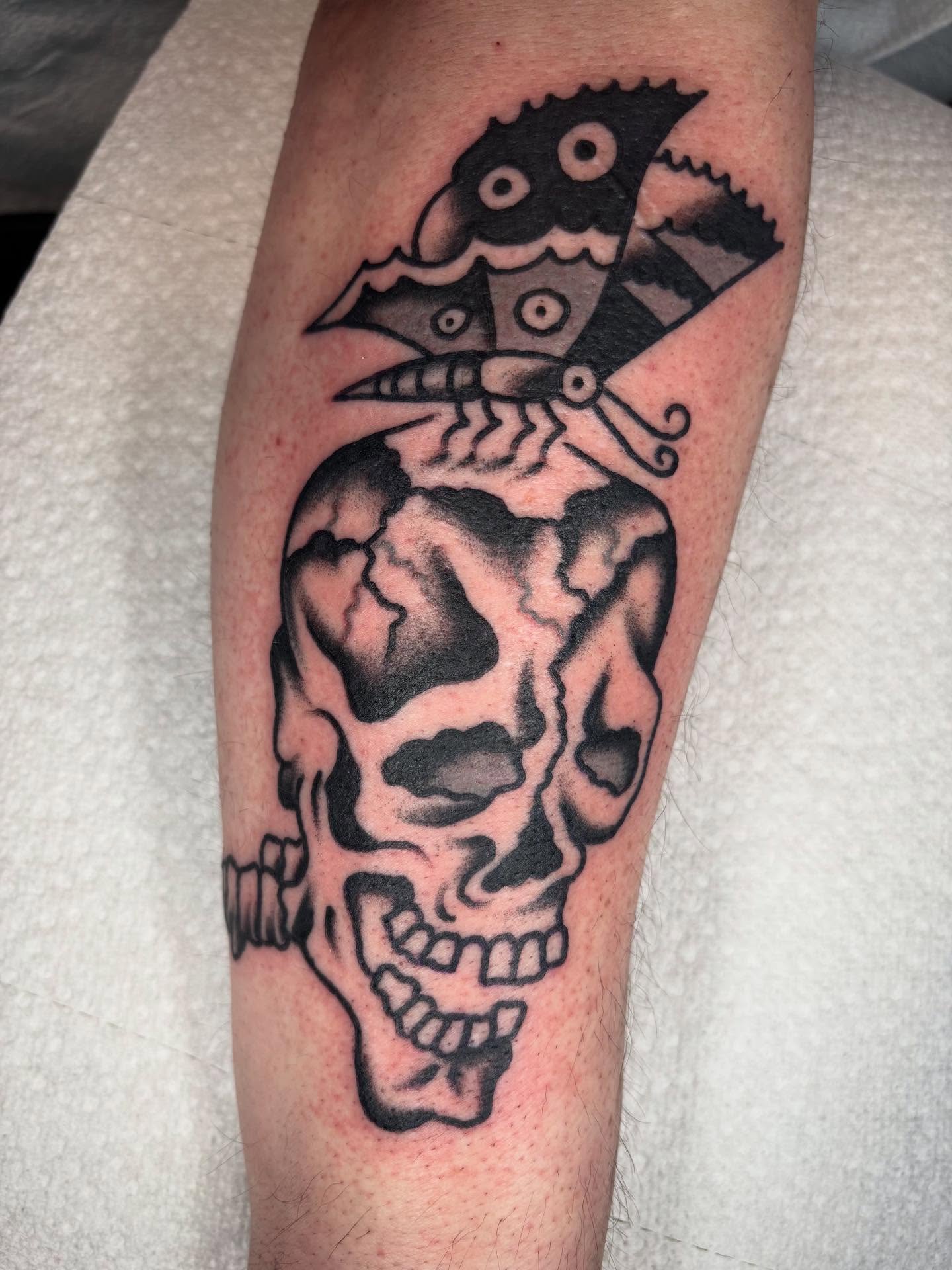 Skull with fish black and grey tattoo on the forearm by 🌹