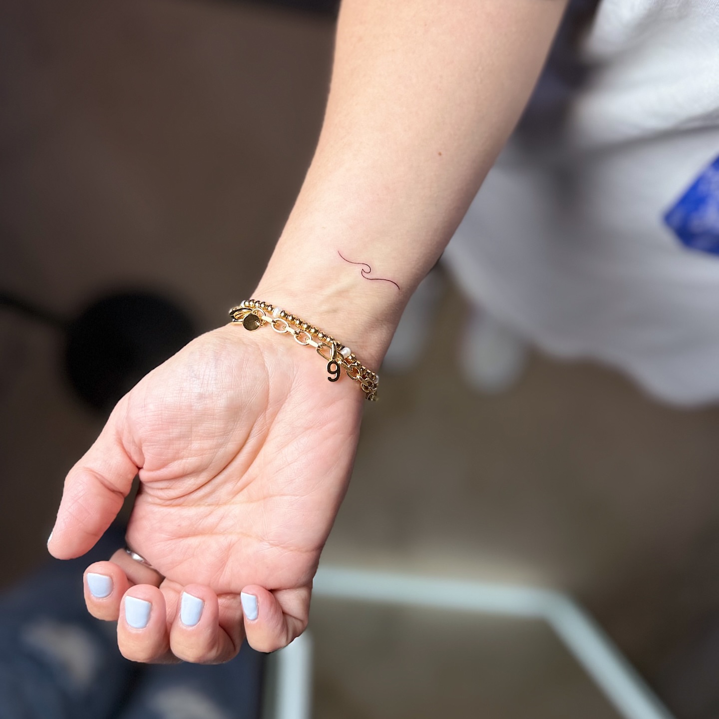 Wave fine line tattoo on the forearm by INK with Christian, Mineral Wells, Texas