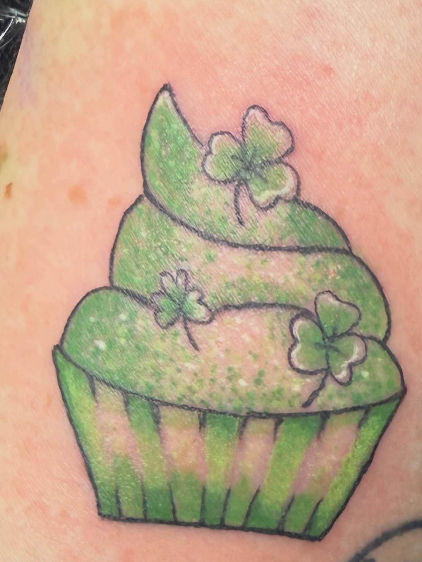 Cupcake new school tattoo on the forearm by Jillian Pardy