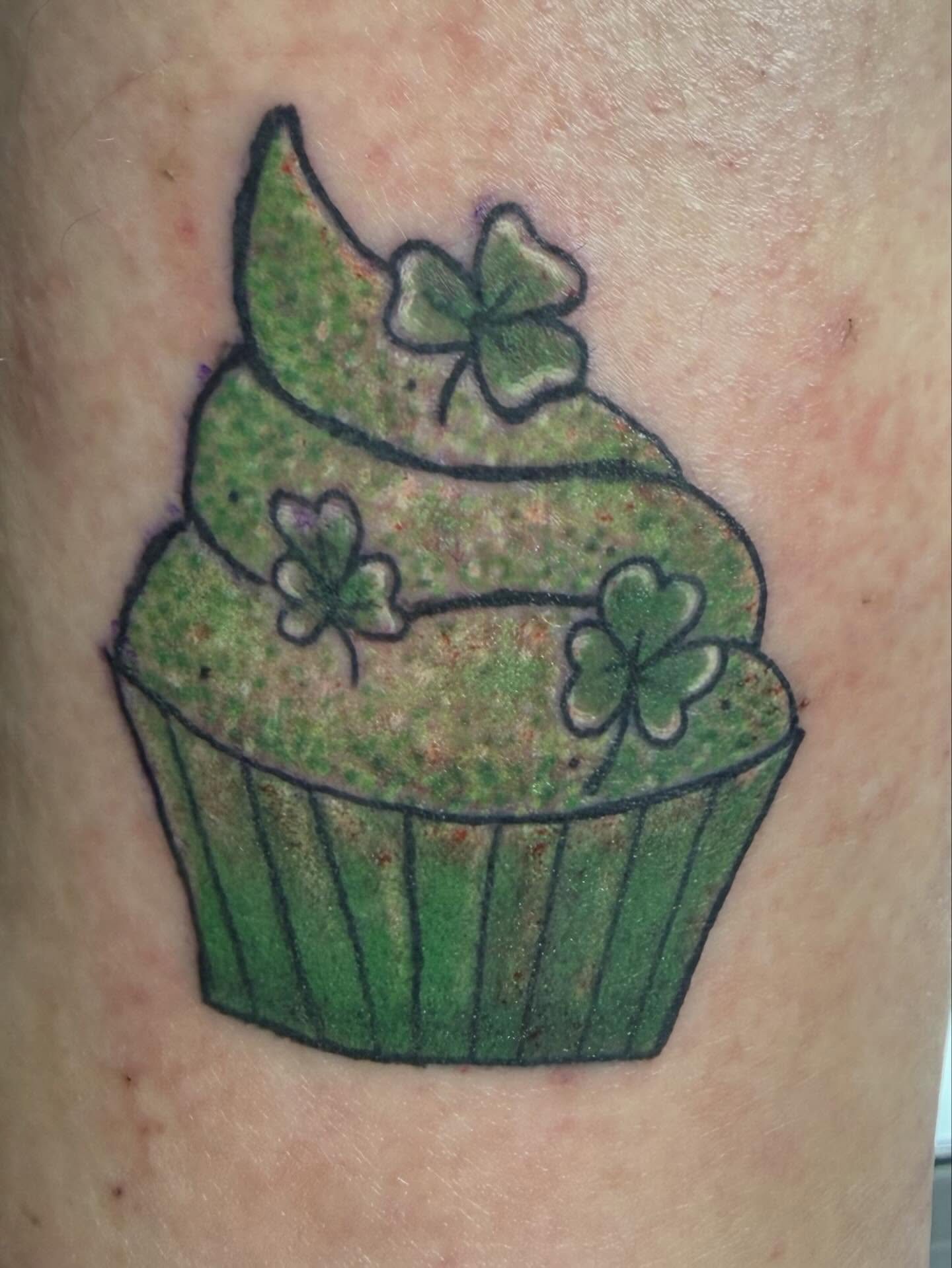Cupcake new school tattoo on the forearm by Jillian Pardy