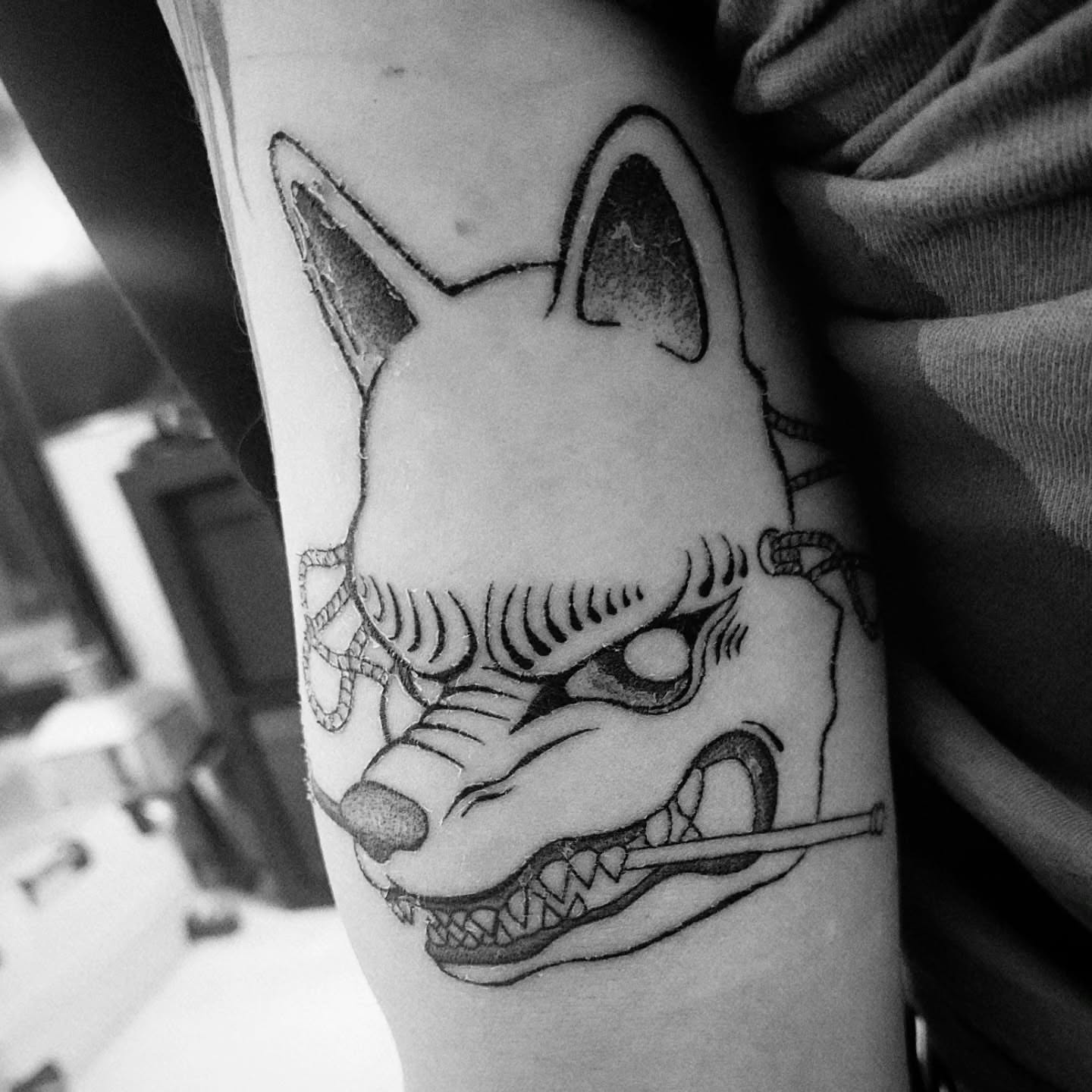 Fox mask black and grey tattoo on the forearm by Kyle - Portland Oregon Tattoo Artist