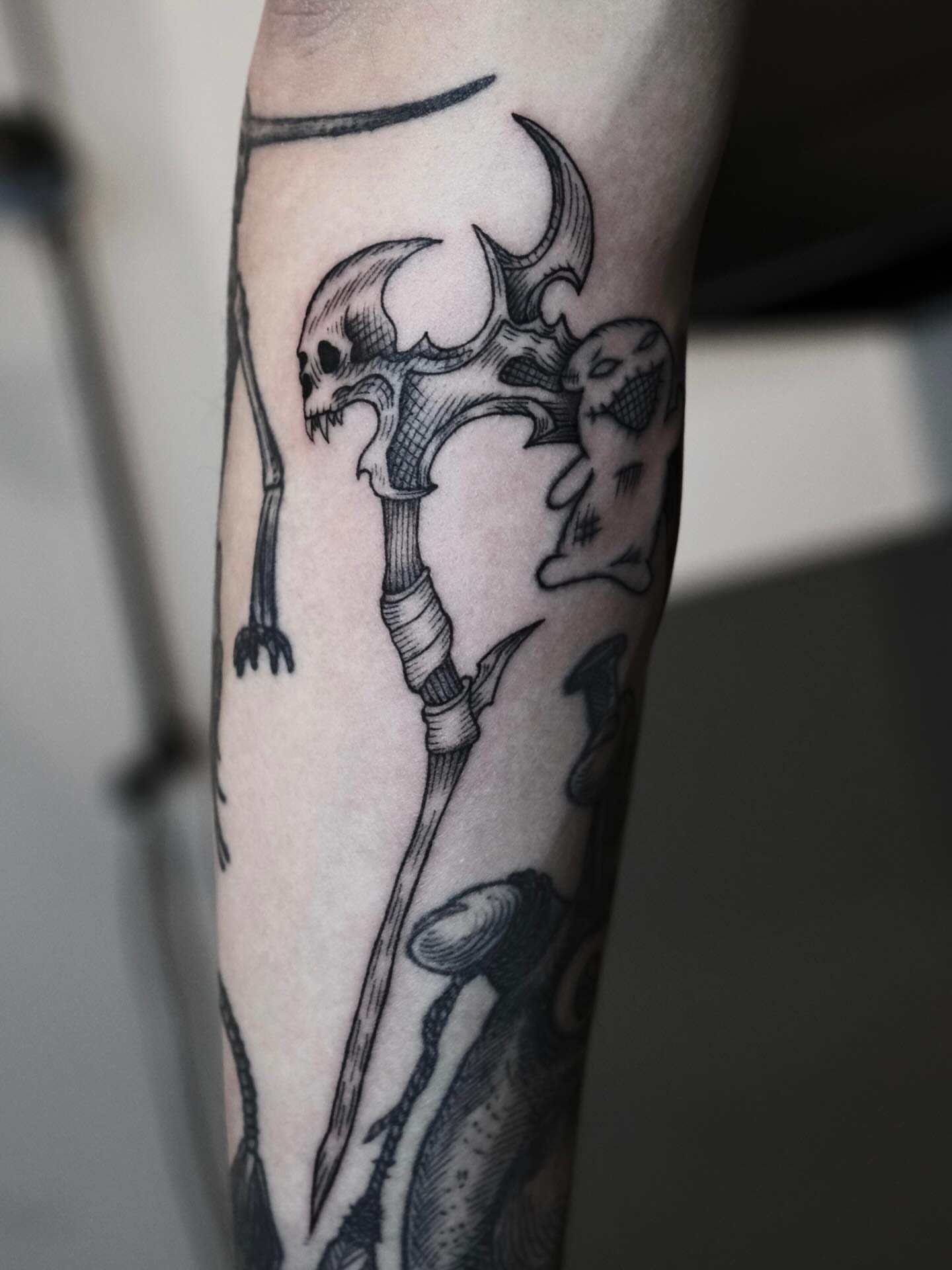 Skeleton staff black and grey tattoo on the forearm by Peter(피터)