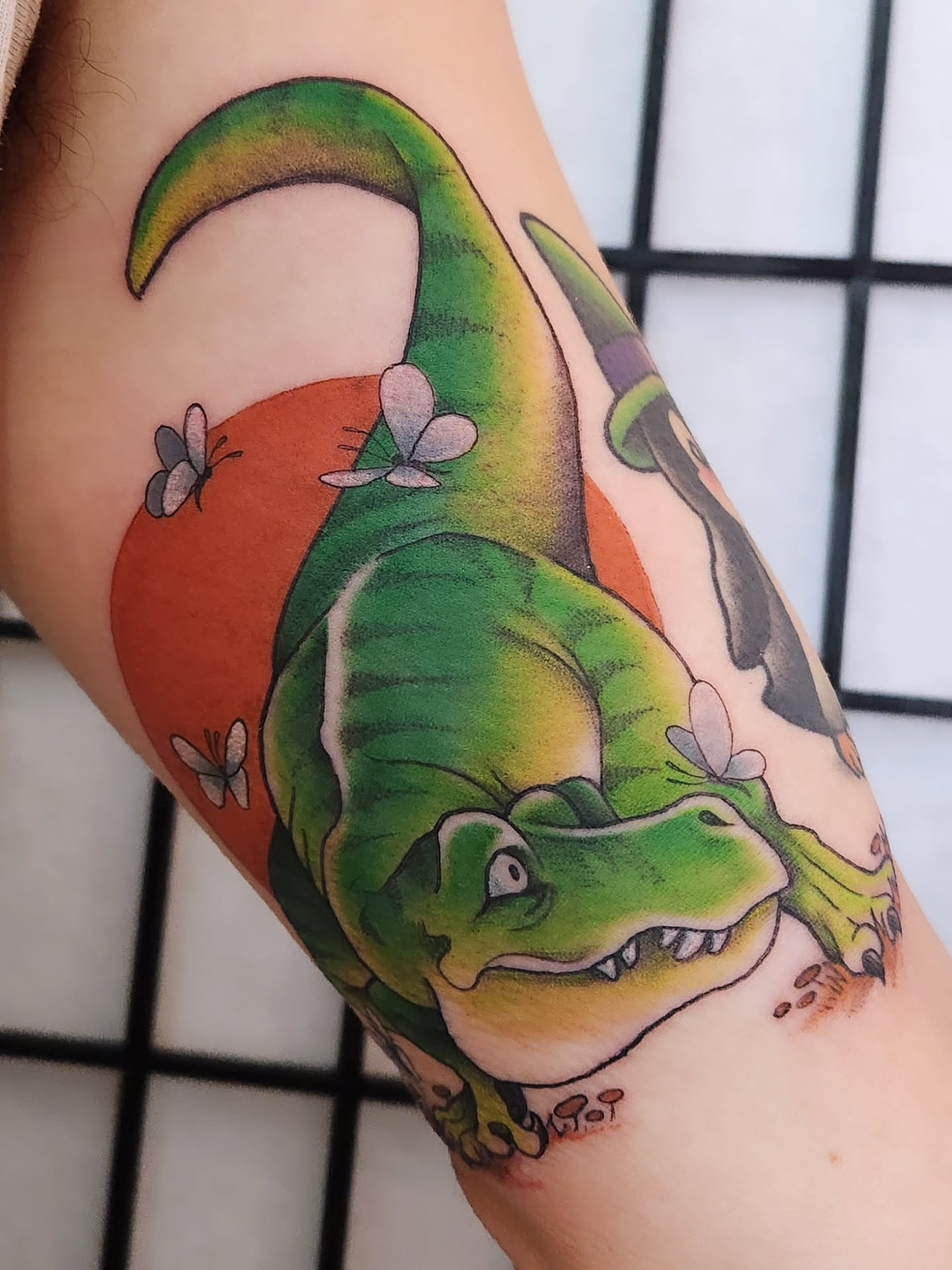 Dinosaur realism tattoo on the forearm by Amanda Boyd - Duh!