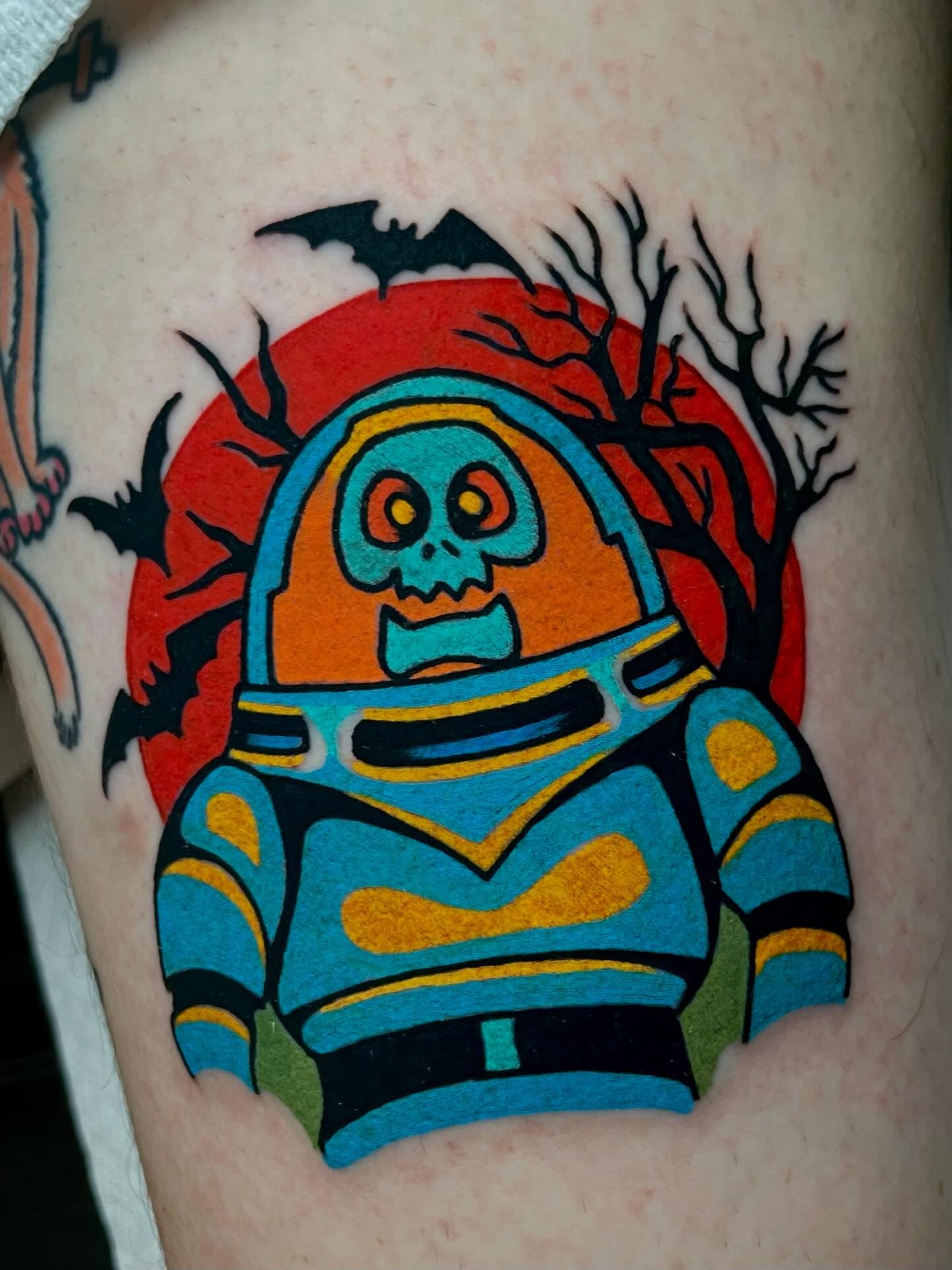 Astronaut skeleton American traditional tattoo on the forearm by Ryan McDonald