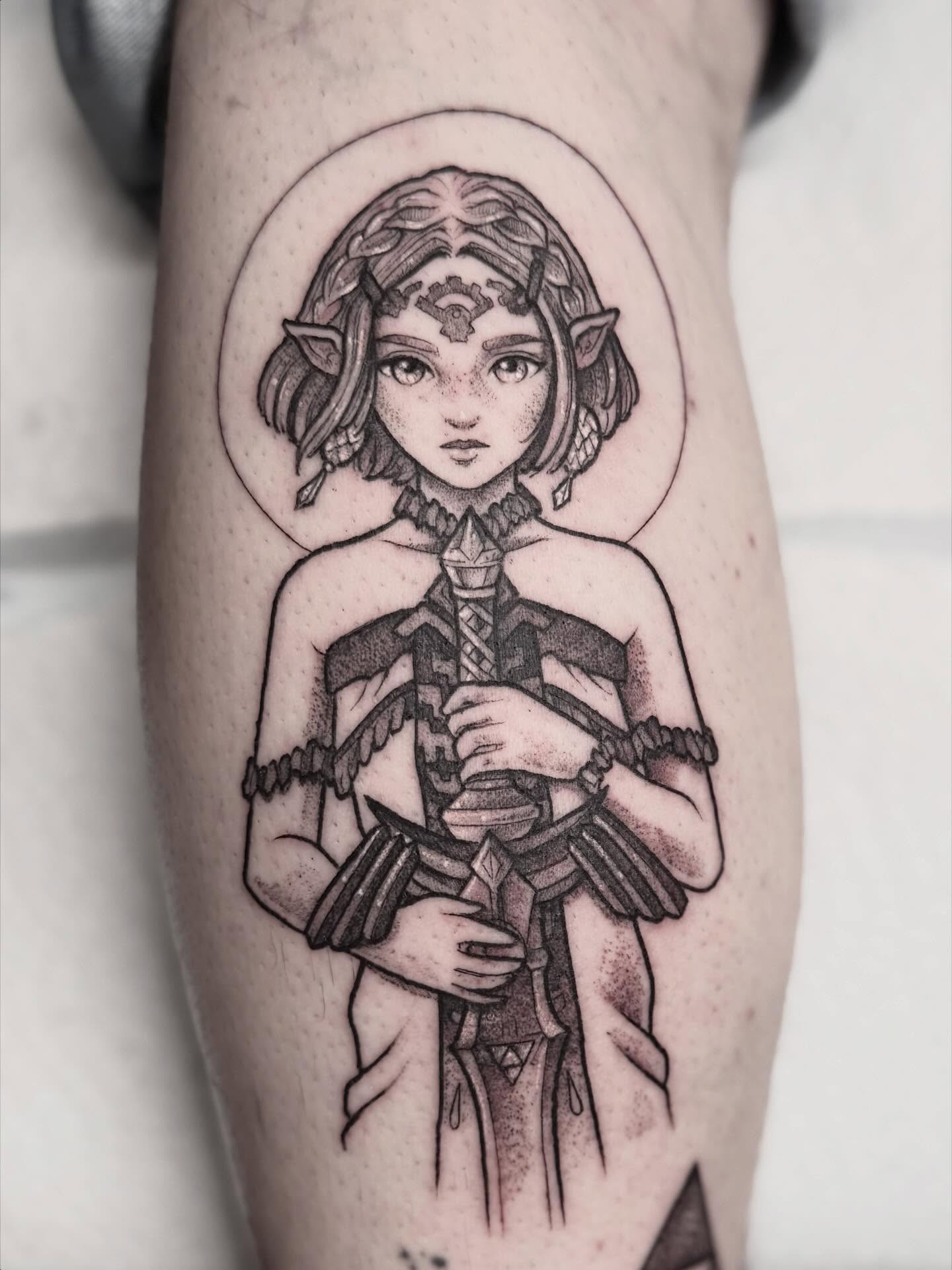 Elf-like character realism tattoo on the forearm by Cincinnati