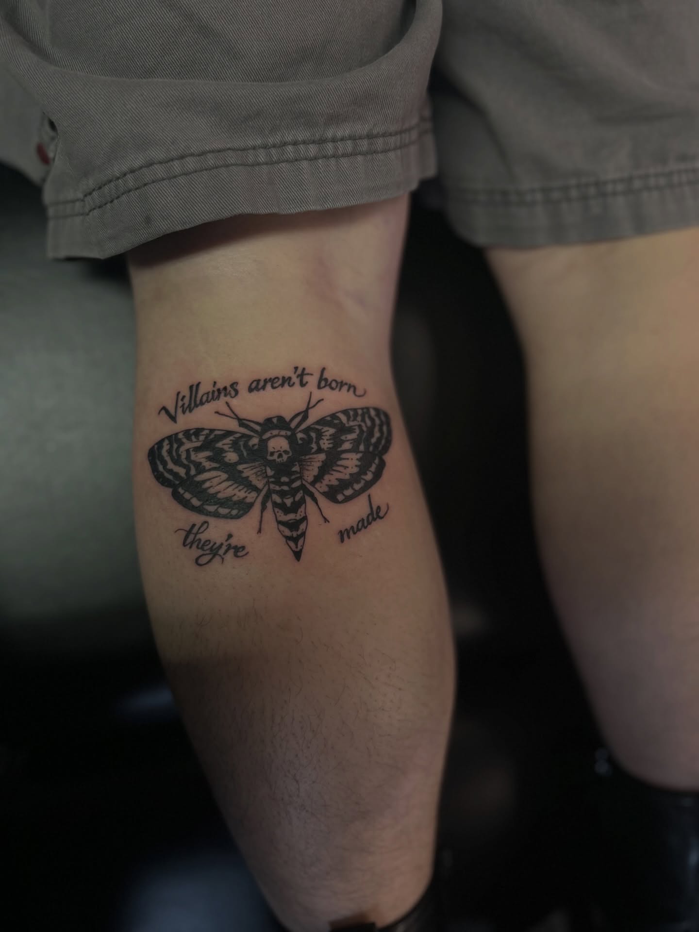 Moth with skull black and grey tattoo on the forearm by Torrey, Austin, Texas