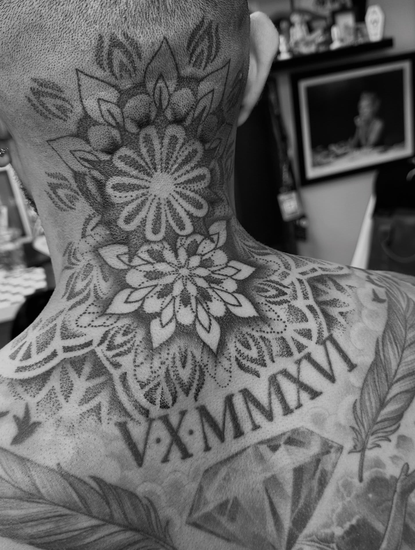 Floral mandala dotwork tattoo on the neck by Ciera Farni, Murray, Utah