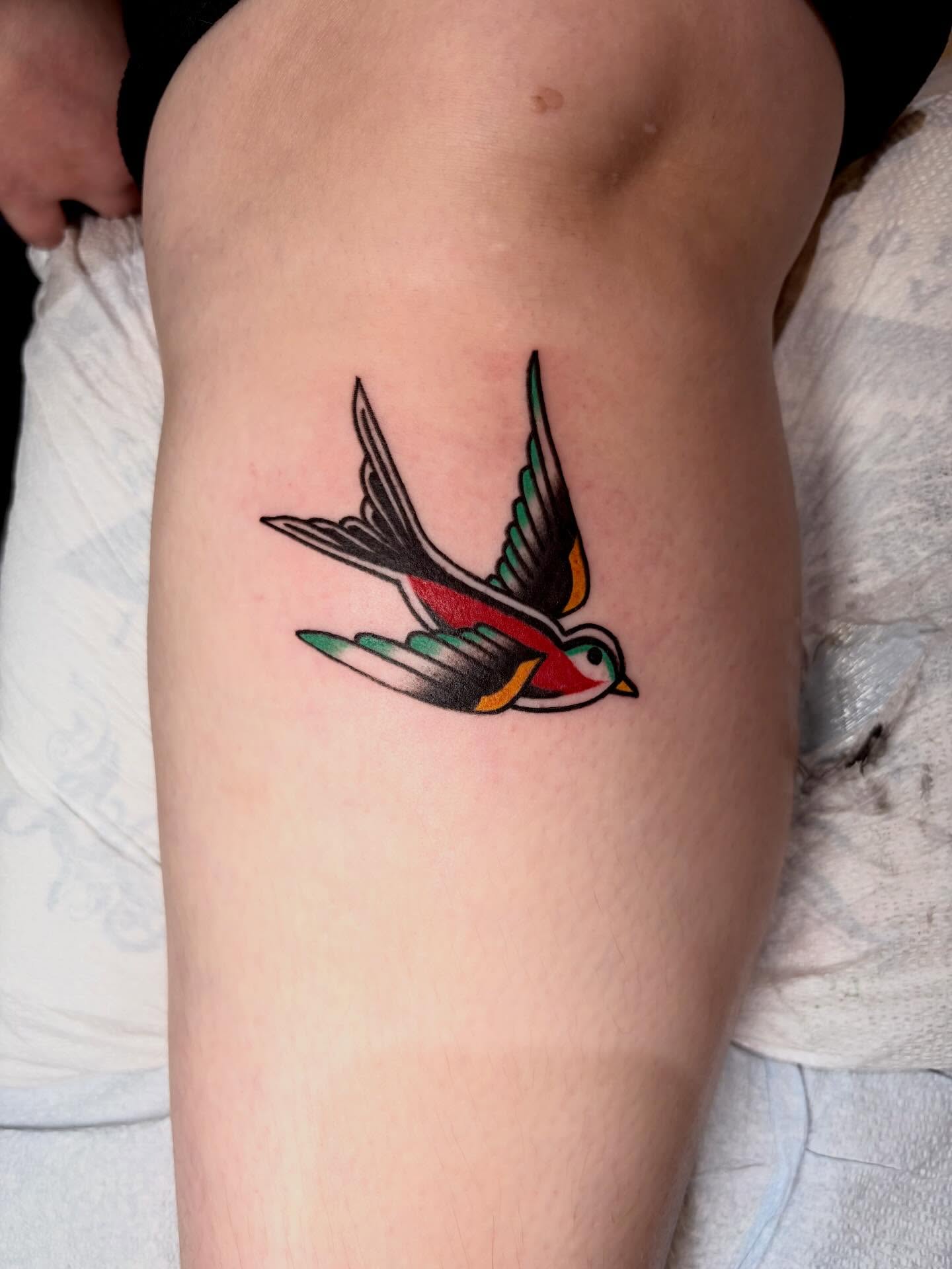 Swallow American traditional tattoo on the forearm by Tash ๐โ๐ฉ