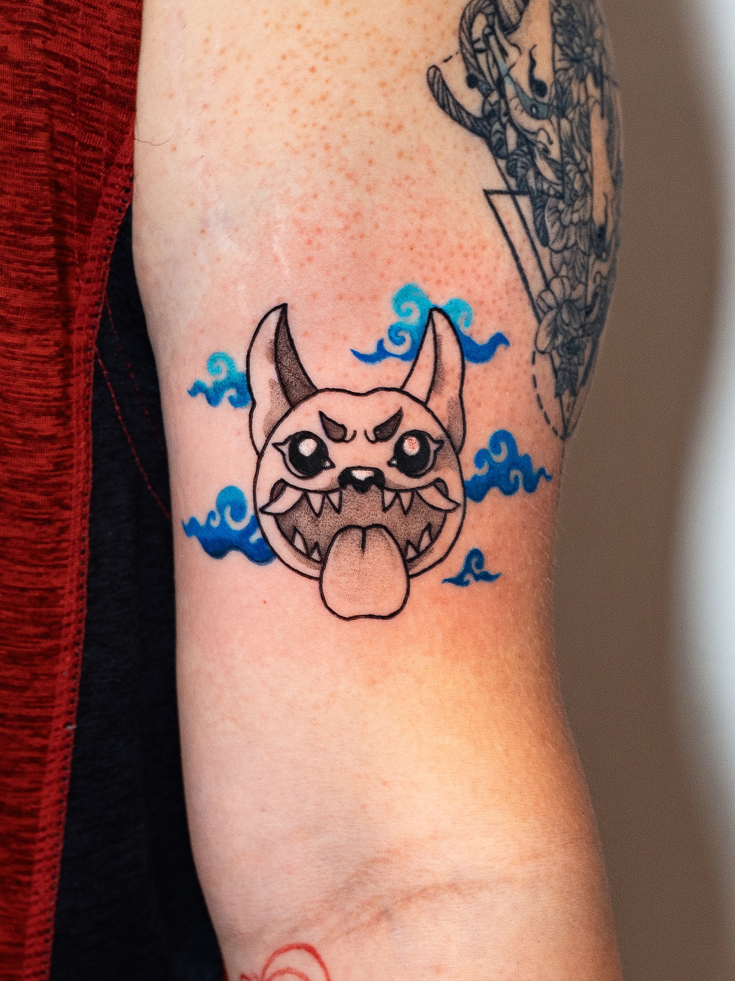Demon mask dotwork tattoo on the forearm by Kalin, Seattle, Washington