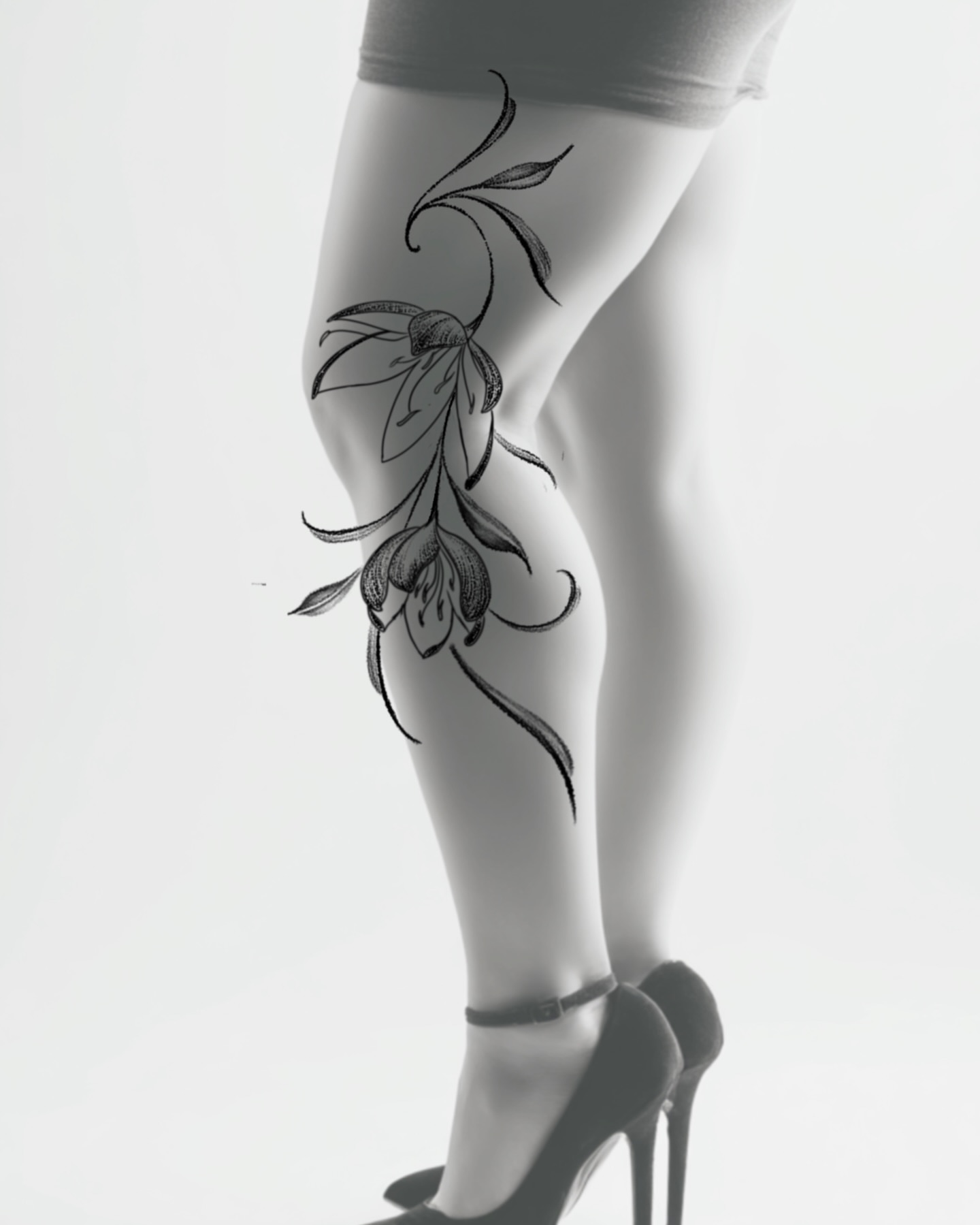 Floral design black and grey tattoo on the leg by Kevin Rotramel, Dayton, Ohio