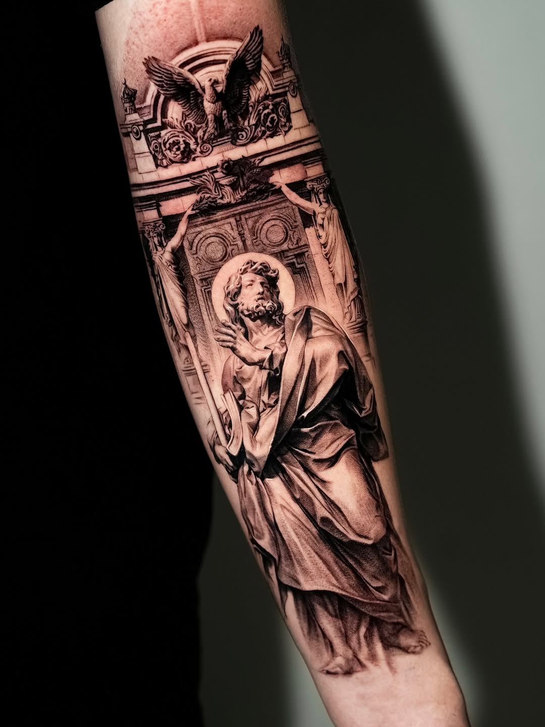 Religious statue and architecture realism tattoo on the forearm by Gody