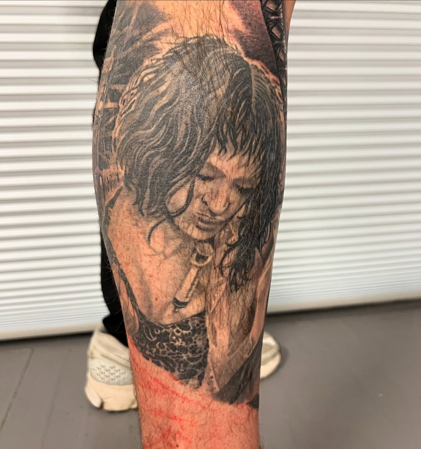 Tattoo by @strikt — realism, black_and_grey