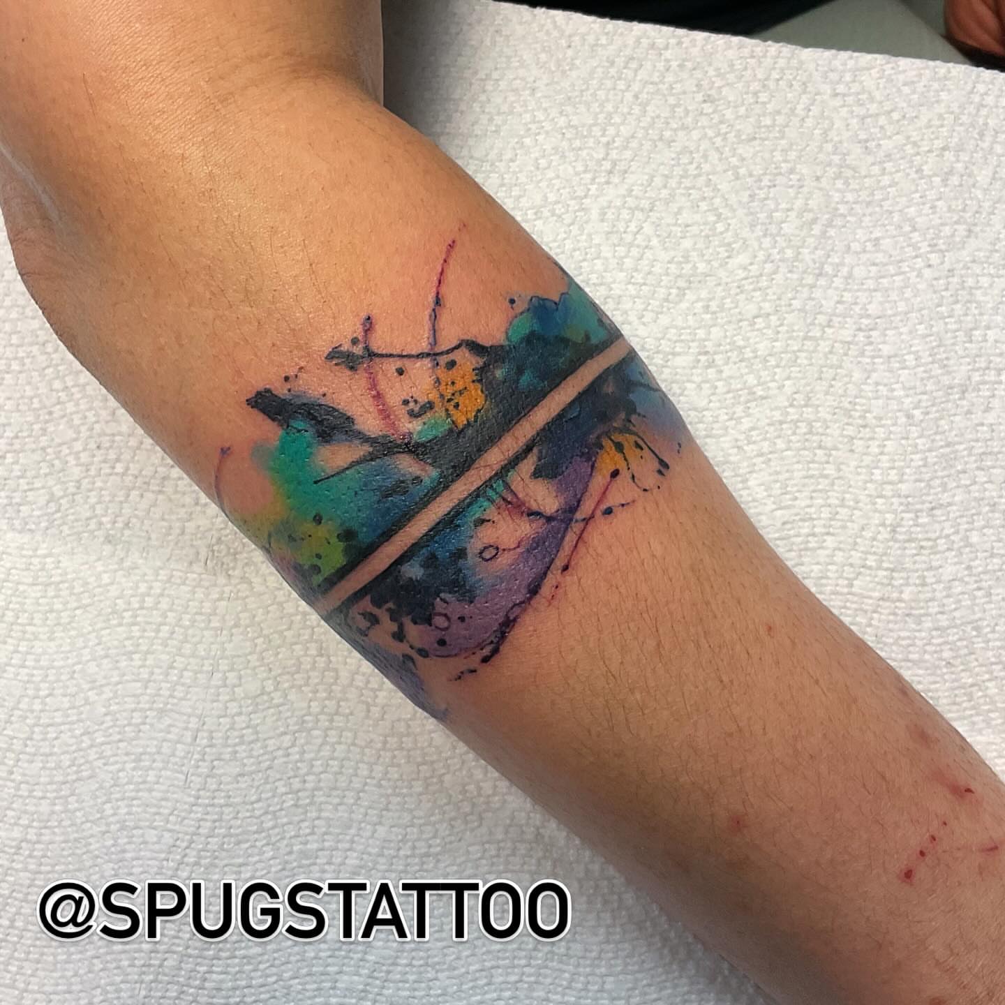 Tattoo by @spugstattoo — watercolor