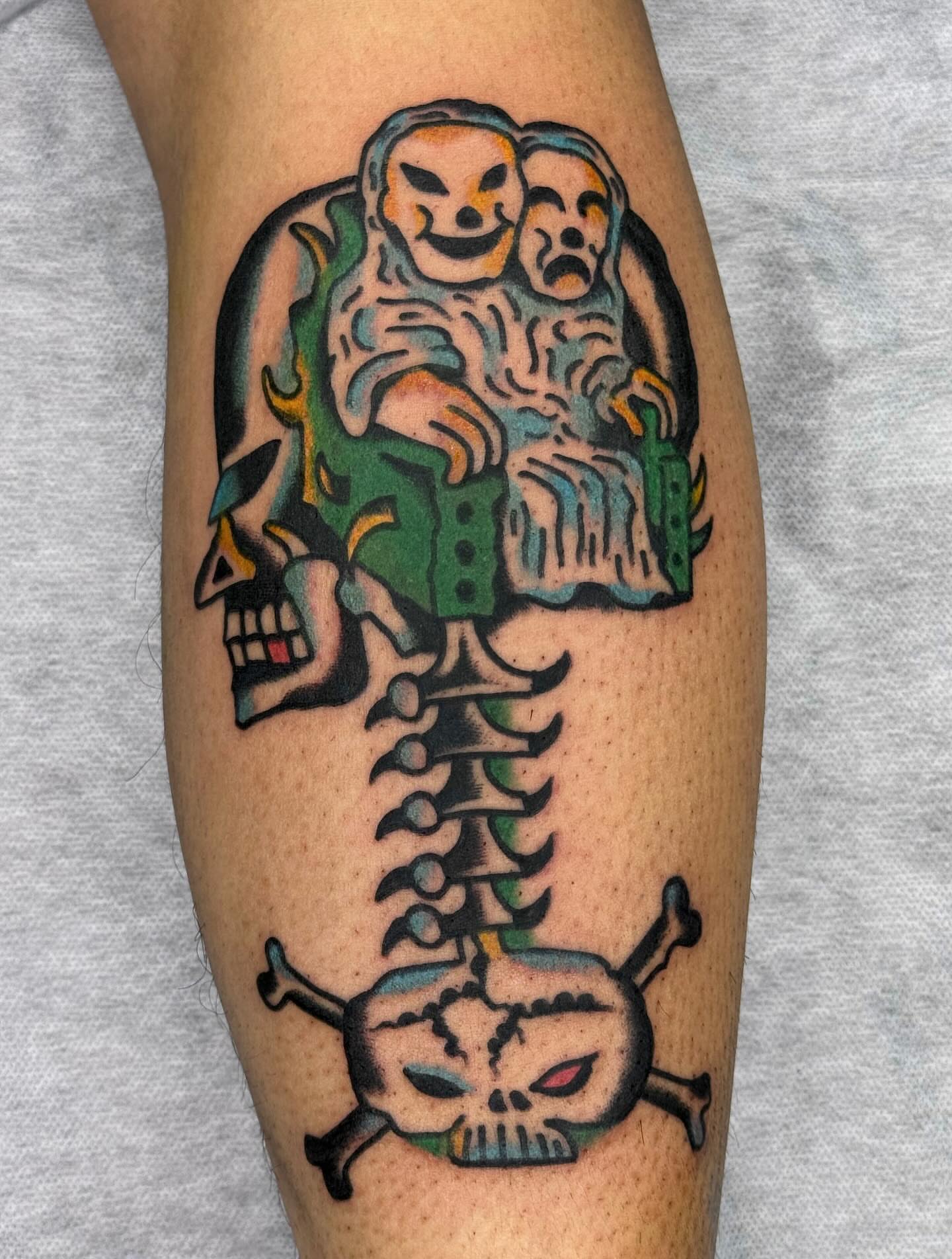 Skull and skeleton American traditional tattoo on the forearm by JAX