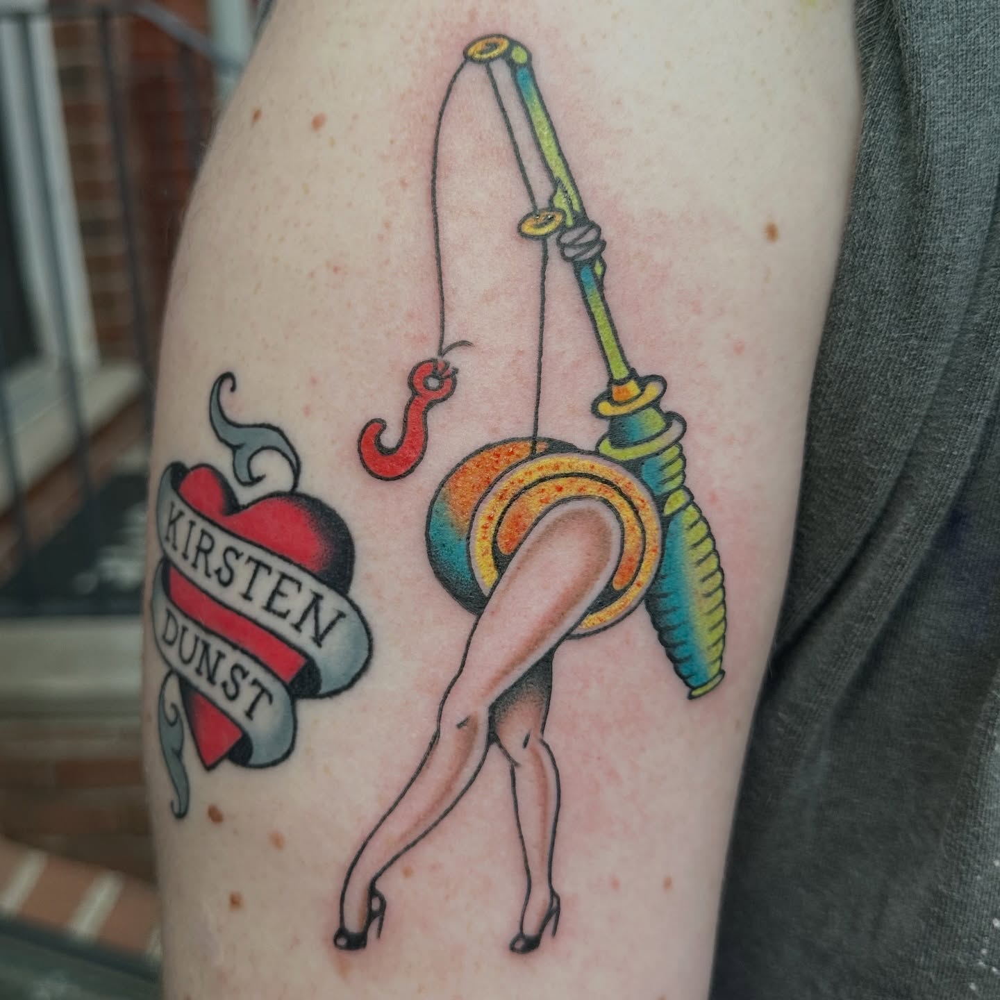 Fishing rod and woman American traditional tattoo on the forearm by kira