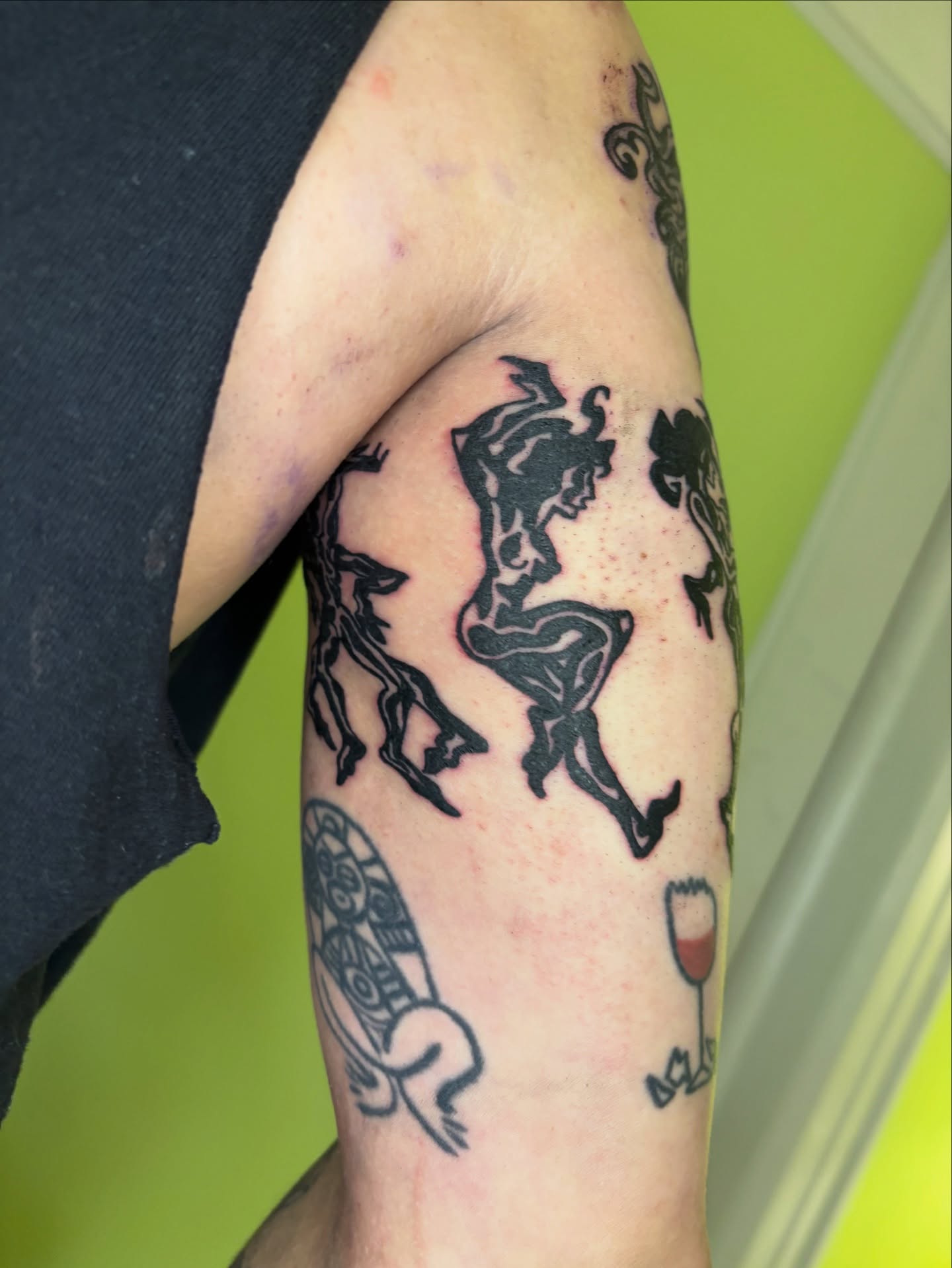 Astronaut black and grey tattoo on the forearm by Grae