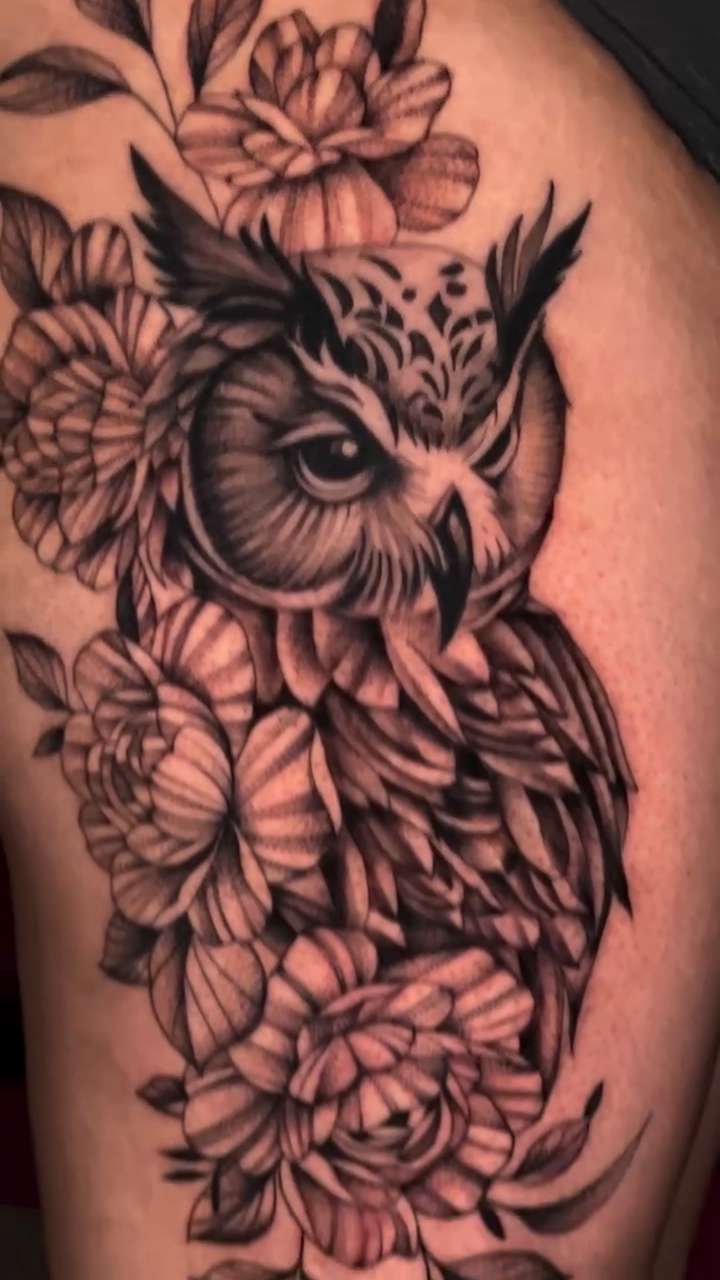 Owl and flowers realism tattoo by Ricky Myotte