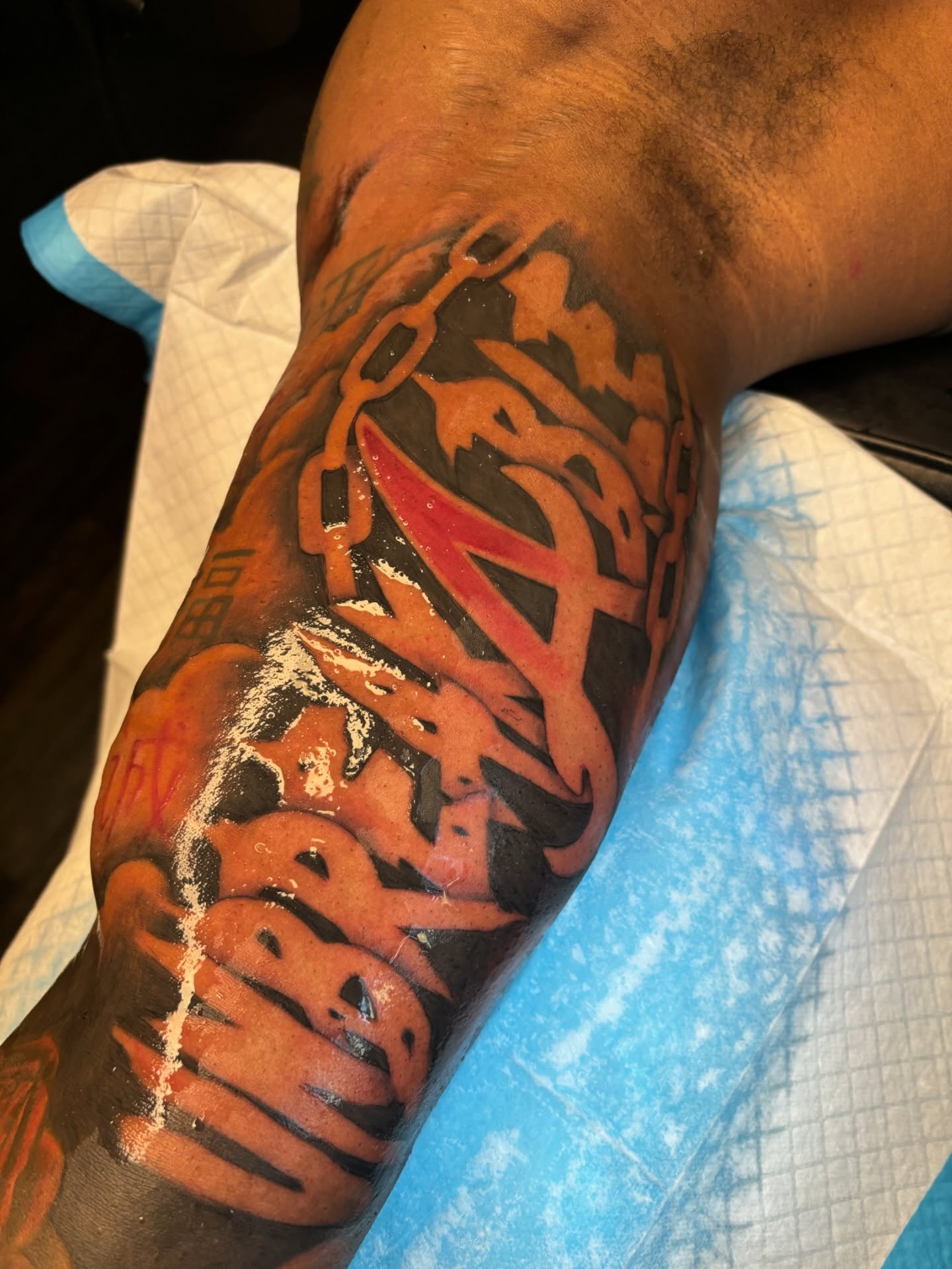 Unbreakable lettering script tattoo on the forearm by FleeDott 🇨🇴