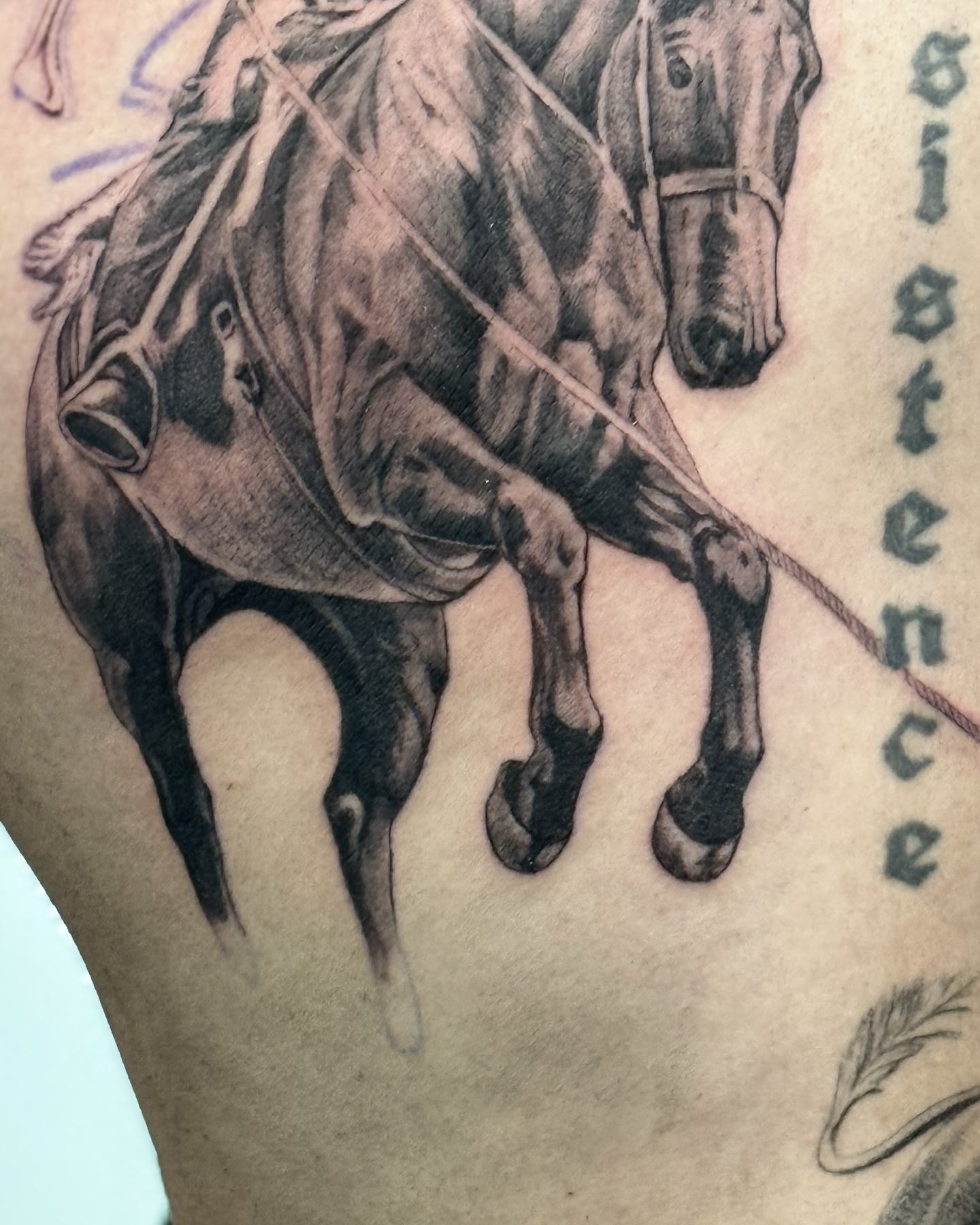 Horse and rider realism tattoo on the thigh by Brows & Tattoos
