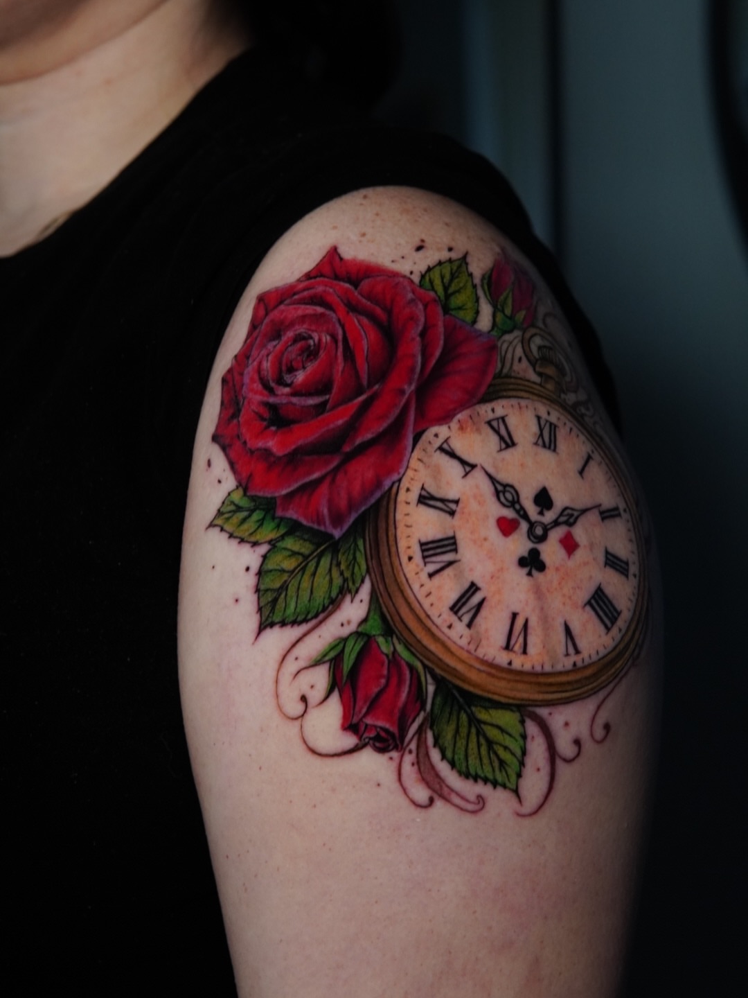 Clock and rose realism tattoo on the shoulder by Sebastian