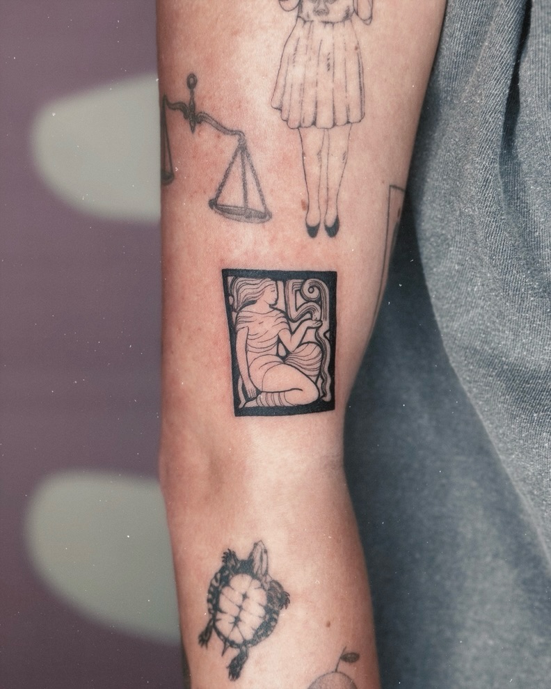 Woman in a square black and grey tattoo on the forearm by 𝗠𝗶𝗱𝗻𝗶𝗴𝗵𝘁 〰️ 𝕄𝕠𝕠𝕟𝕝𝕚𝕘𝕙𝕥