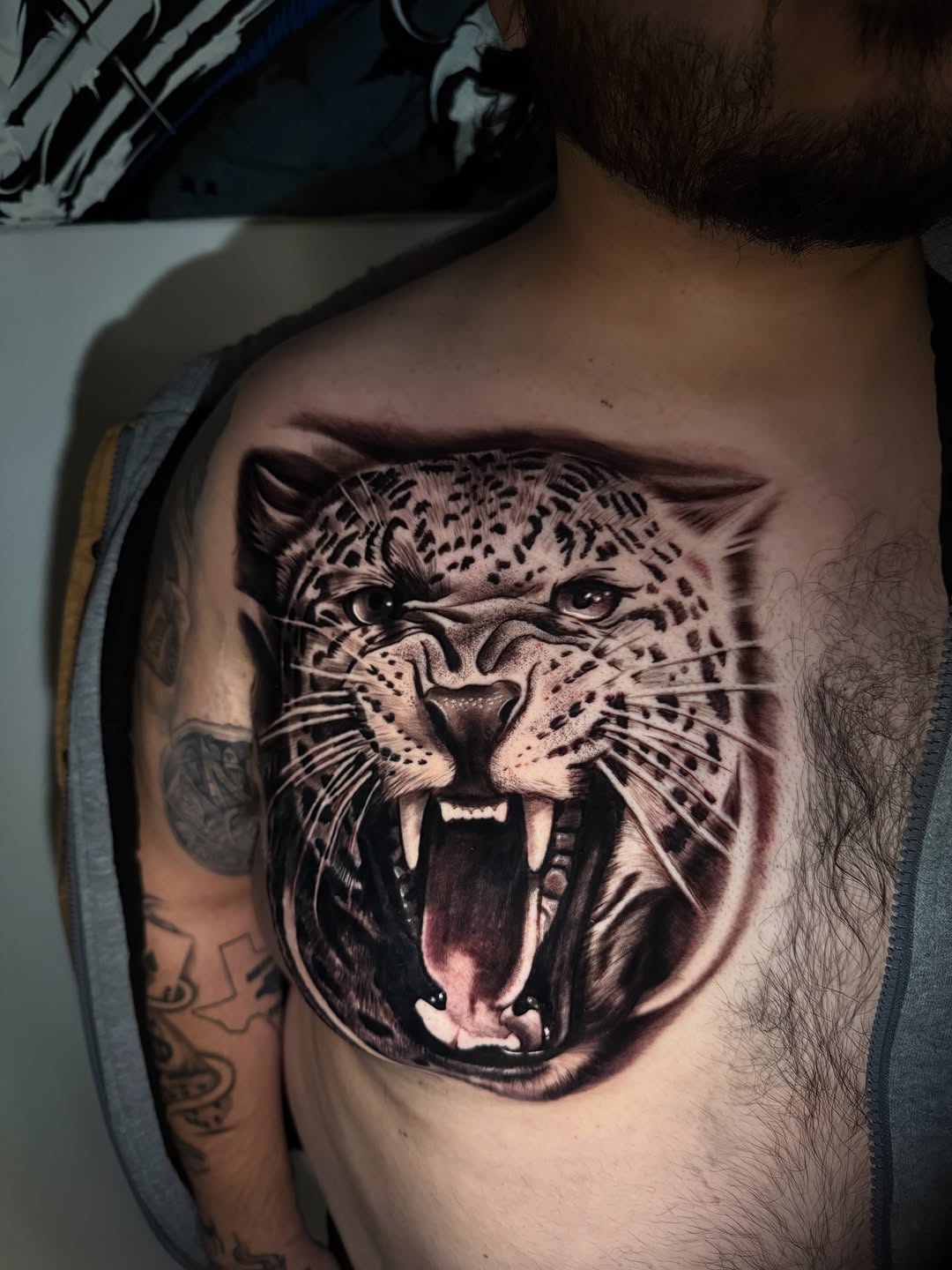 Leopard head realism tattoo on the chest by inkzombi