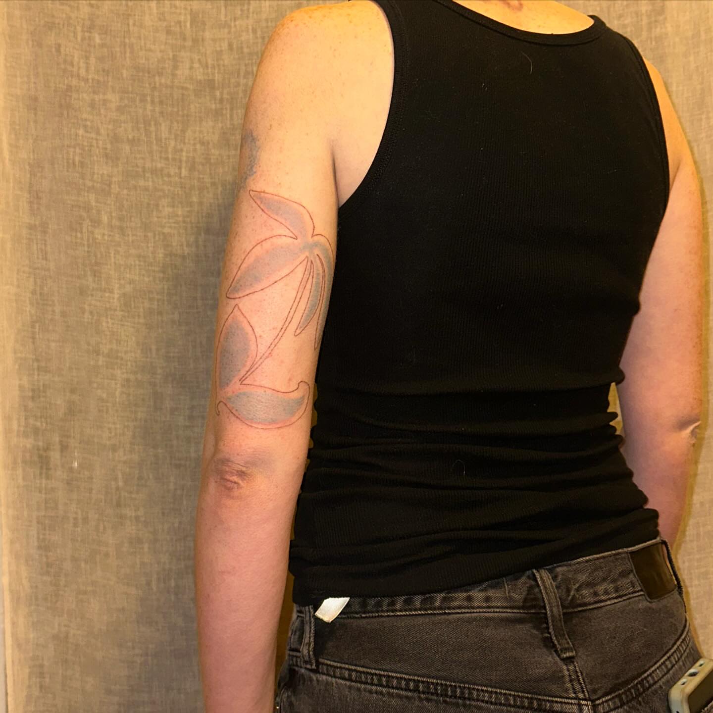 Palm leaf geometric tattoo on the forearm by kate