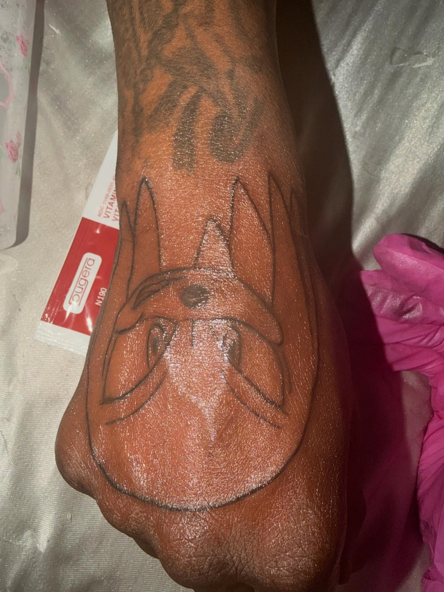 Dog anime tattoo on the forearm by @bloodline__legacy