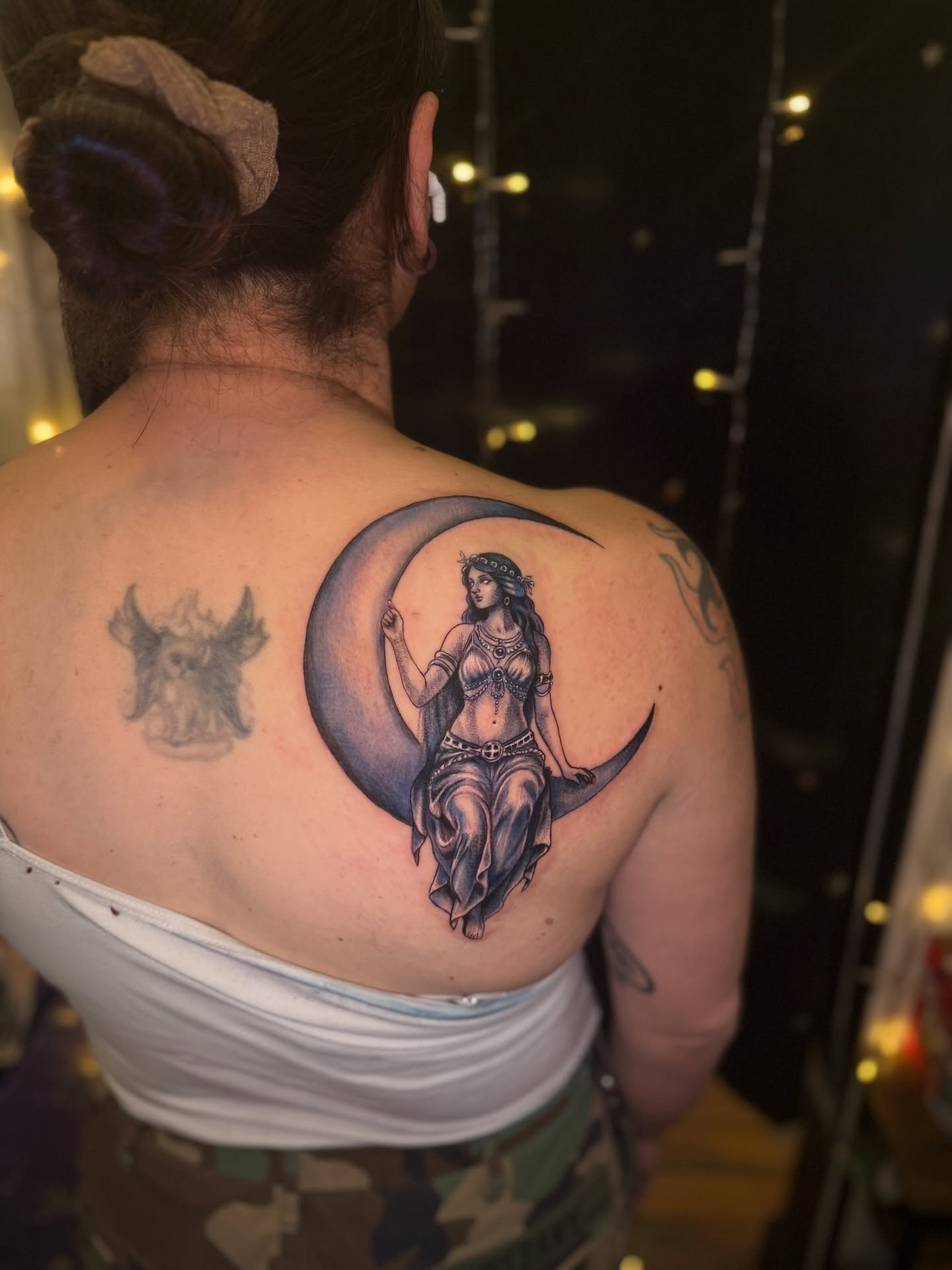 Woman on crescent moon realism tattoo on the back by ❈°binx°❈