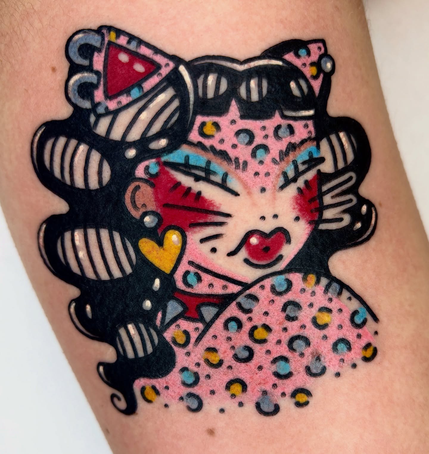 Kitty dotwork tattoo on the thigh by Bella