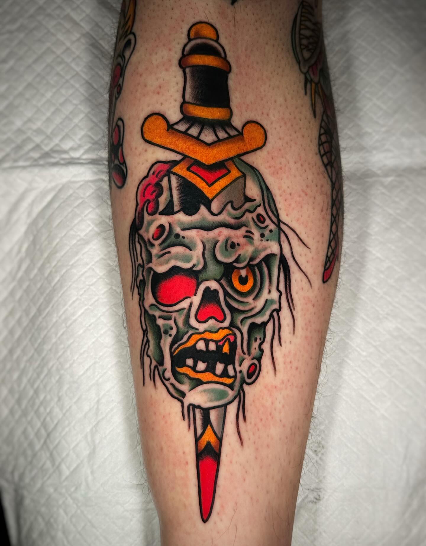 Demon skull American traditional tattoo on the forearm by Alex Finnerty, Reading, Massachusetts