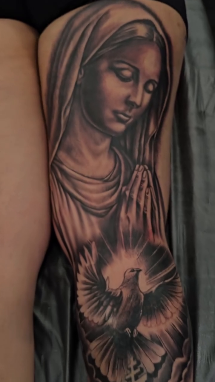 Virgin Mary with dove and cross realism tattoo by Richie Garcia, Hesperia, California