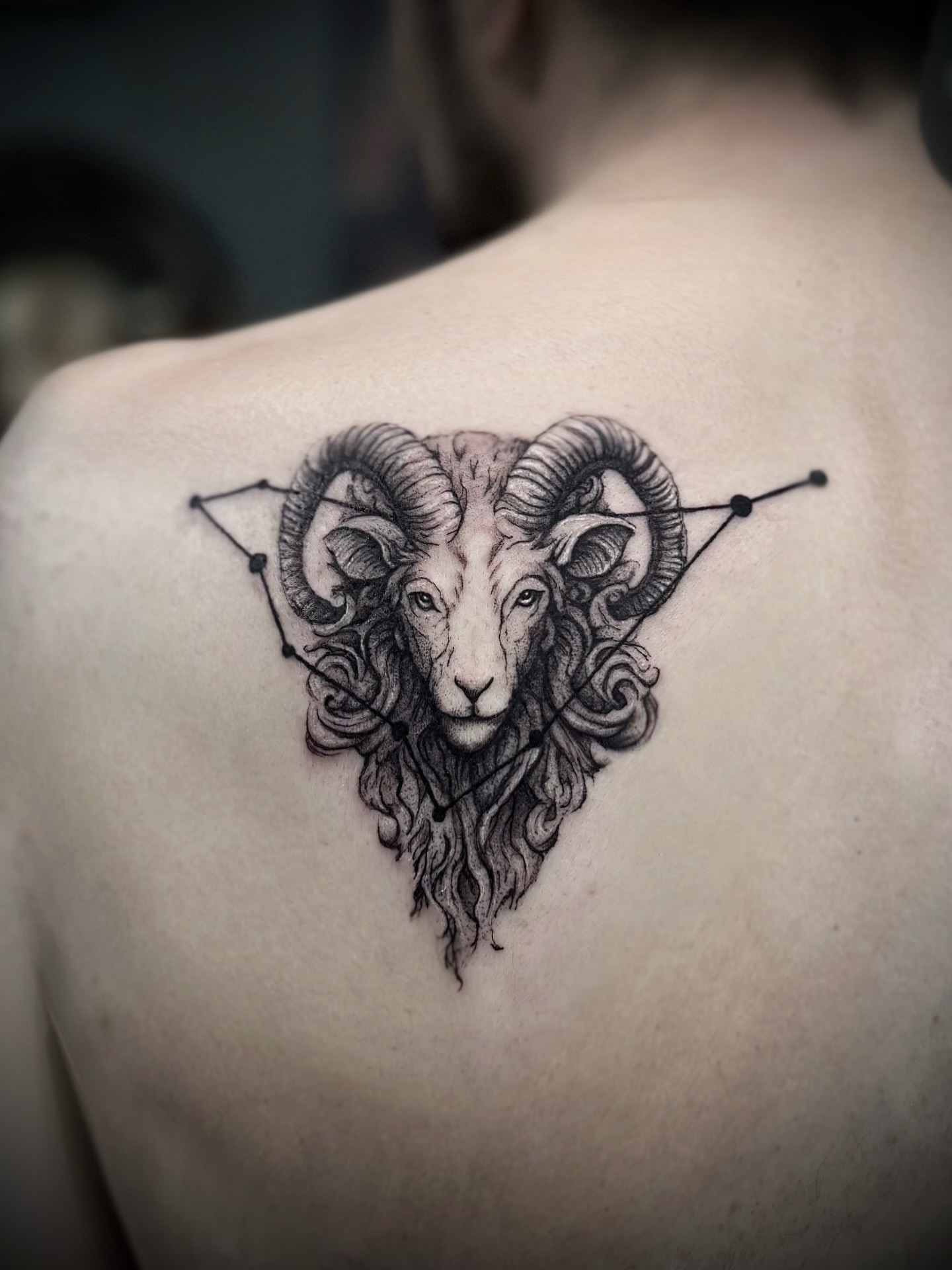 Ram head geometric tattoo on the shoulder by Miro Ink Tattoo