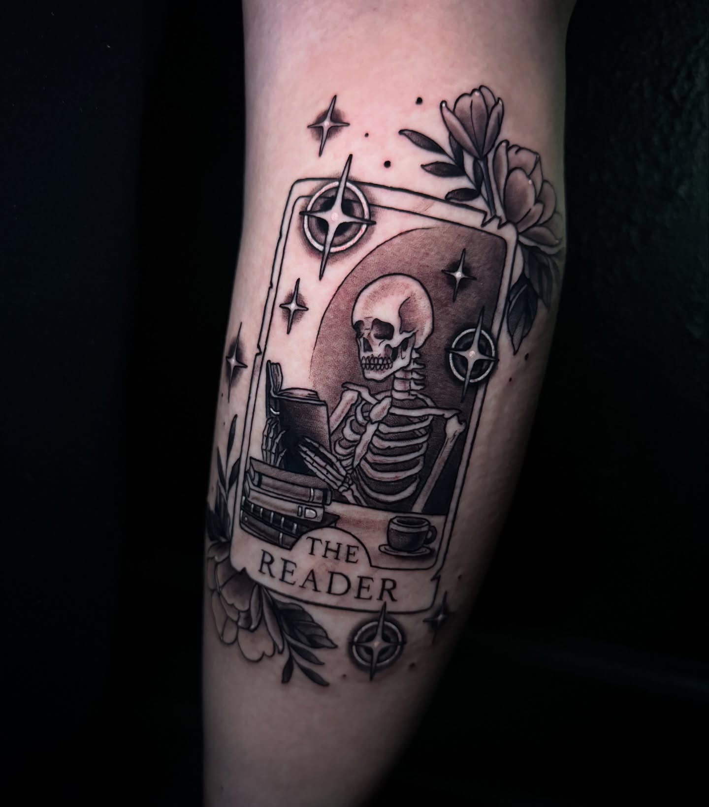 The reader tarot card black and grey tattoo on the forearm by Dee Florian