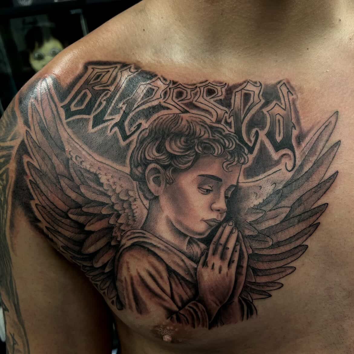 Praying angel realism tattoo on the chest by @artinjections667