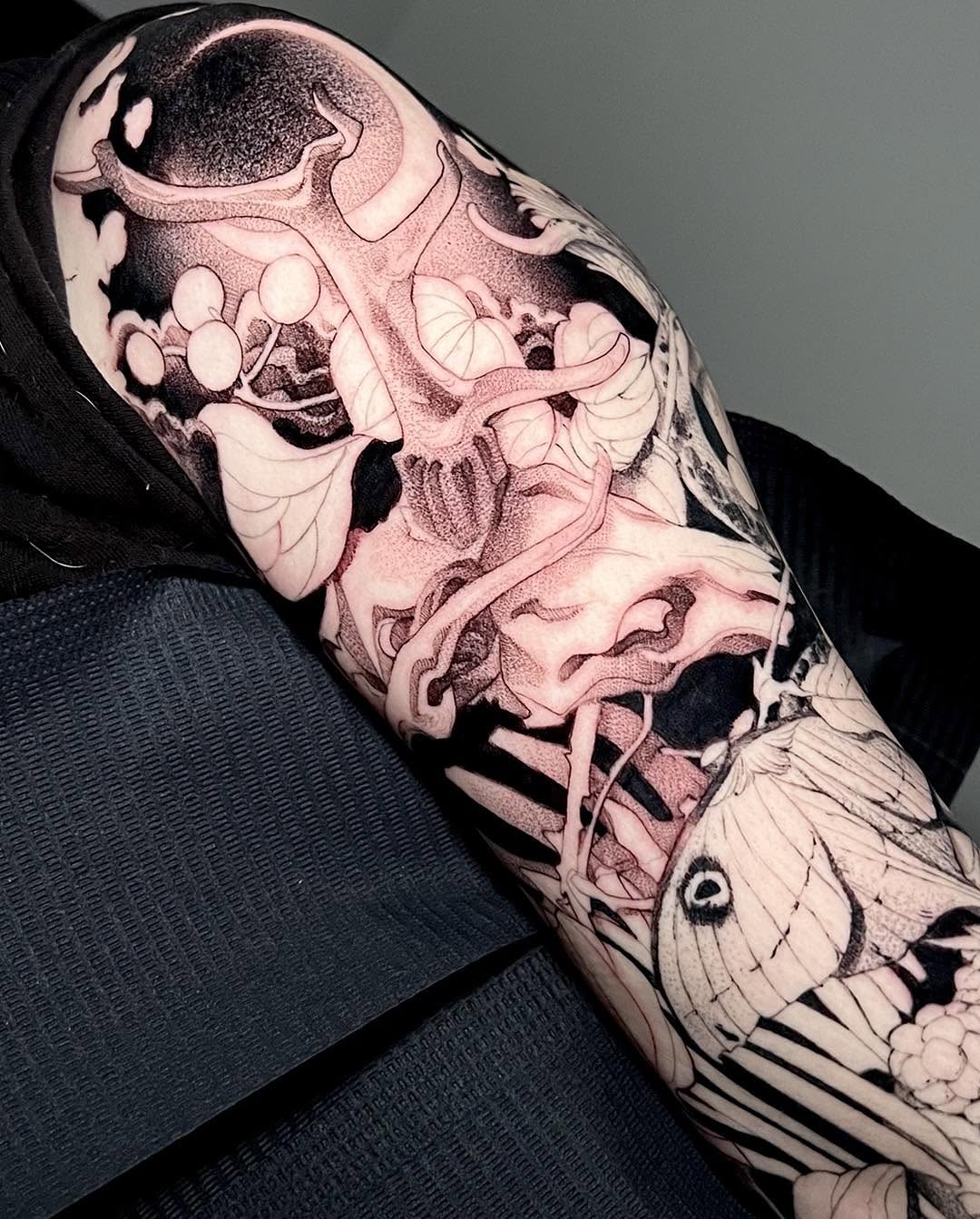 Fish and seaweed dotwork tattoo on the forearm by Haylie Adele Strong