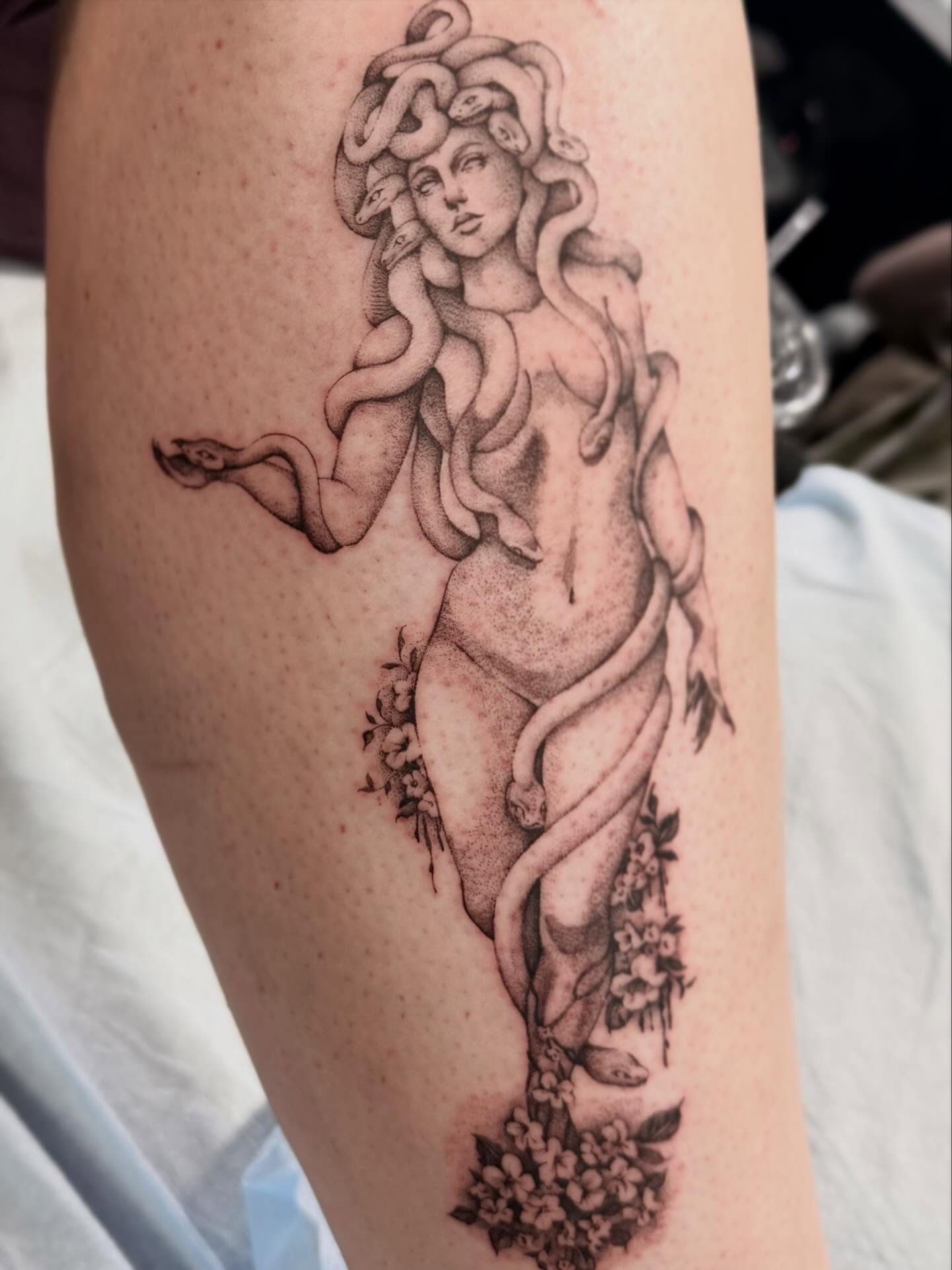 Medusa black and grey tattoo on the thigh by Ash F