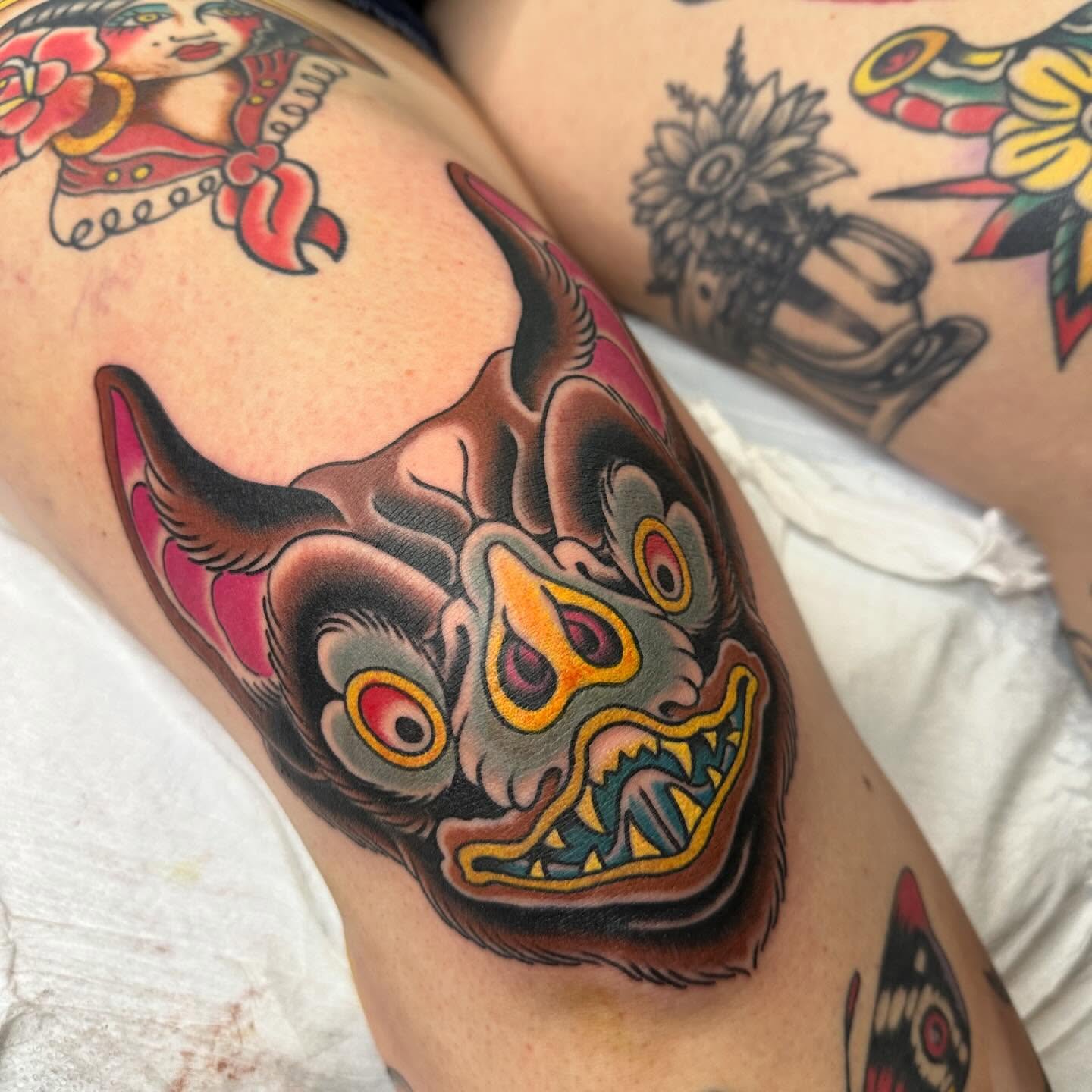 Demon mask American traditional tattoo on the thigh by Tony Medellin 7X9X