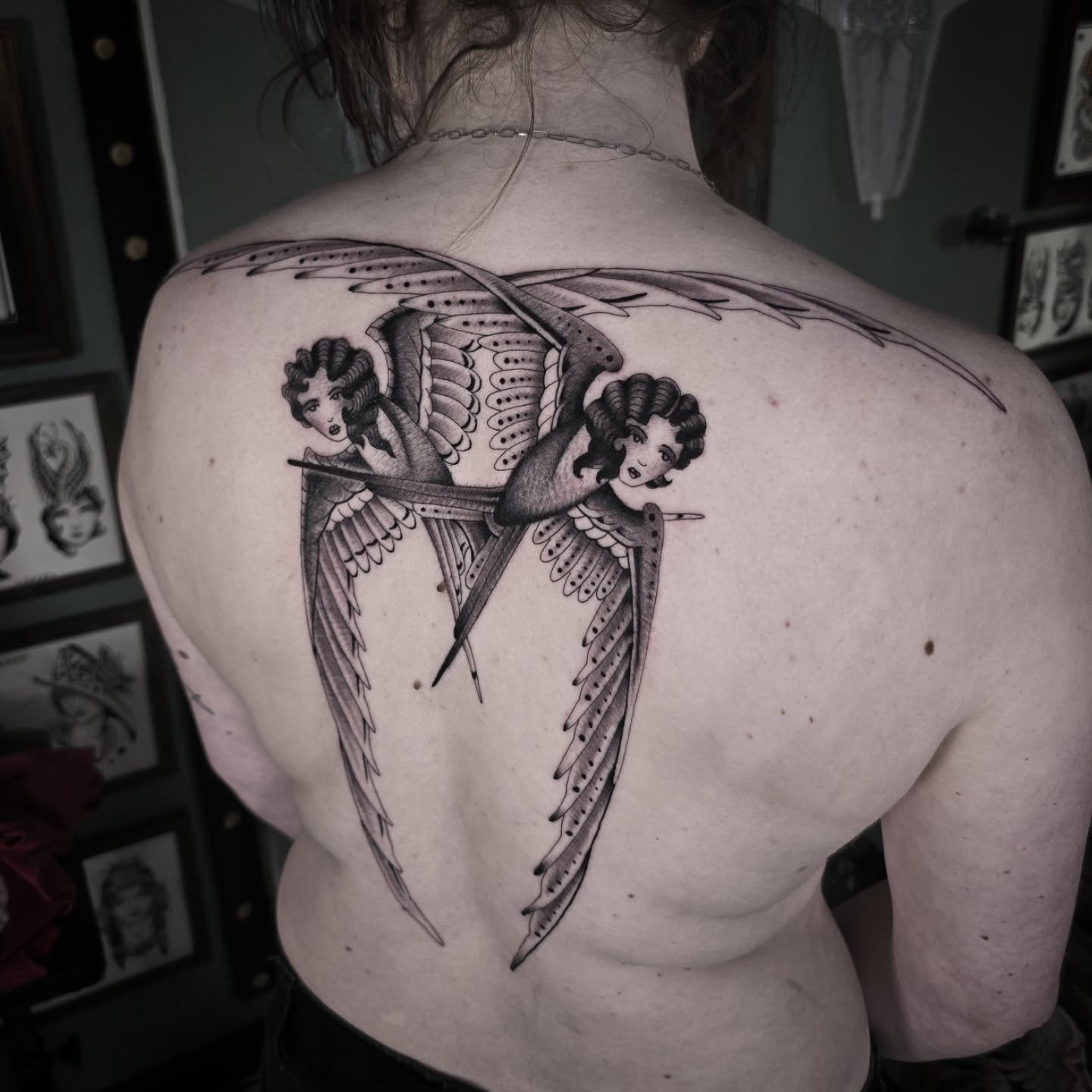 Winged woman black and grey tattoo on the back by Aaron Dor
