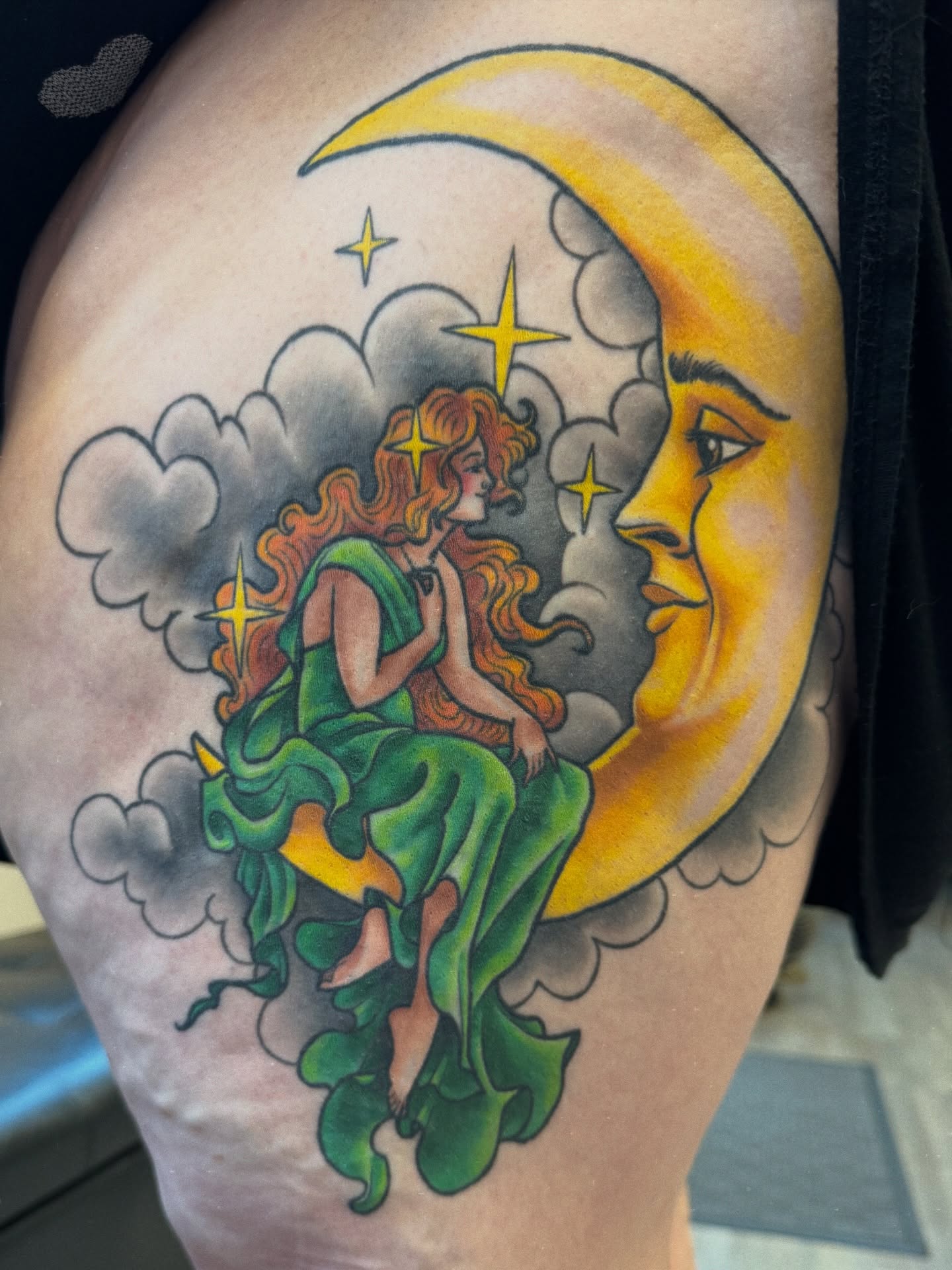 Woman on moon American traditional tattoo on the thigh by Anna Wall