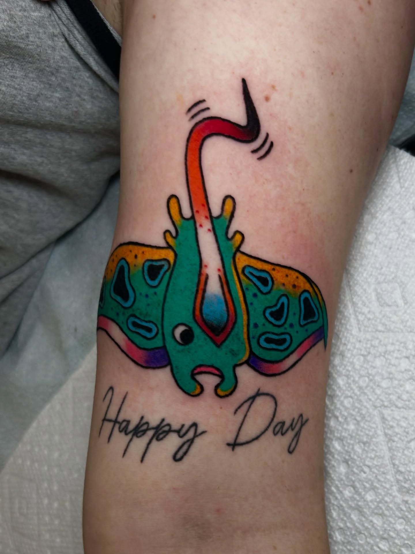 Ray fish new school tattoo on the forearm by Lily May