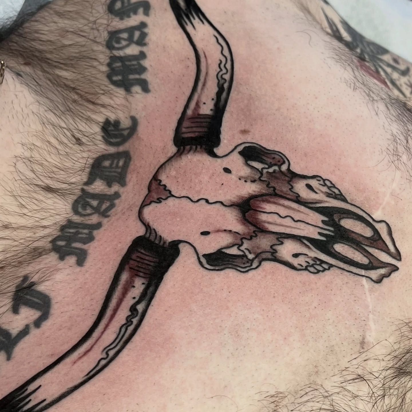 Bull skull black and grey tattoo on the chest by @brandonhuckabey, Denver, Colorado