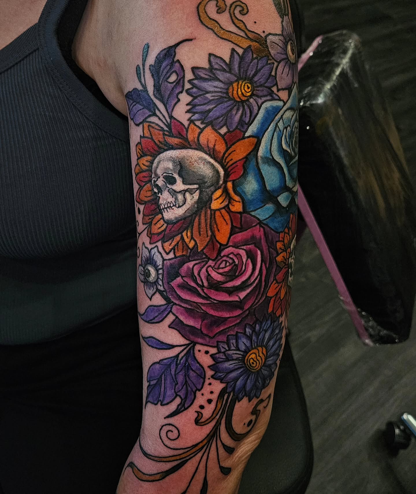 Floral and skull design American traditional tattoo on the forearm by Angie Griffith 🥰, Glendale, Arizona
