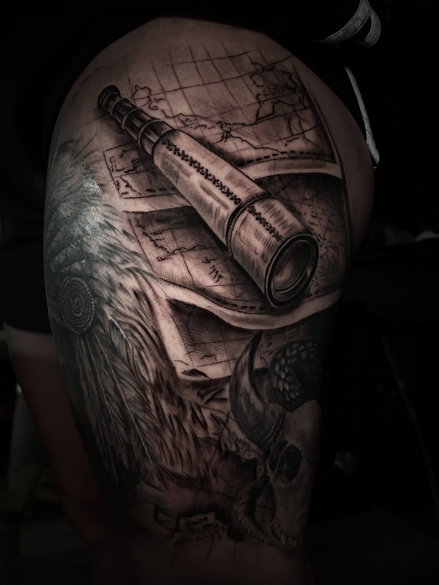 Exploration theme realism tattoo on the shoulder by Ashley Denise