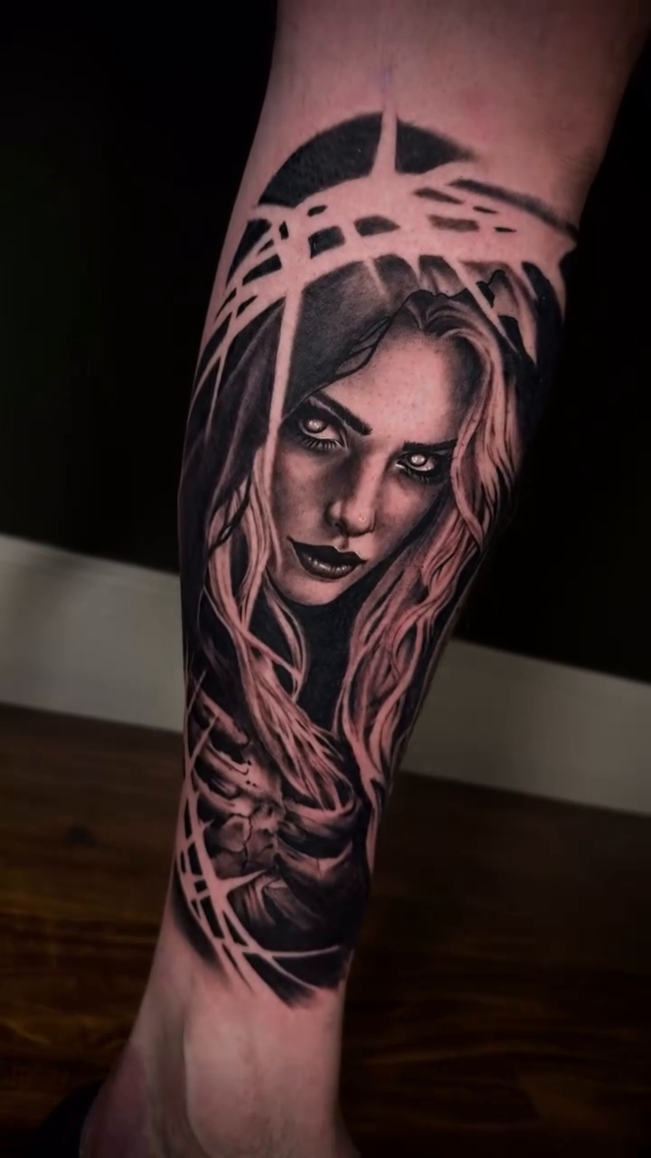 Realism tattoo on the calf by Terence Taylor