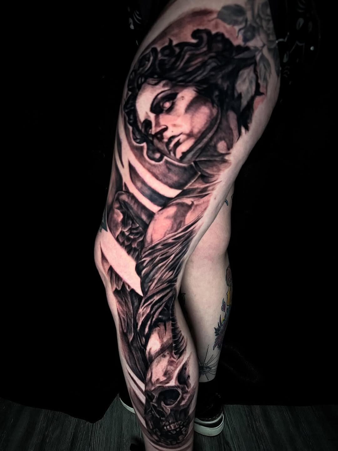 Tattoo by @skunk_punk_ink — realism, black_and_grey