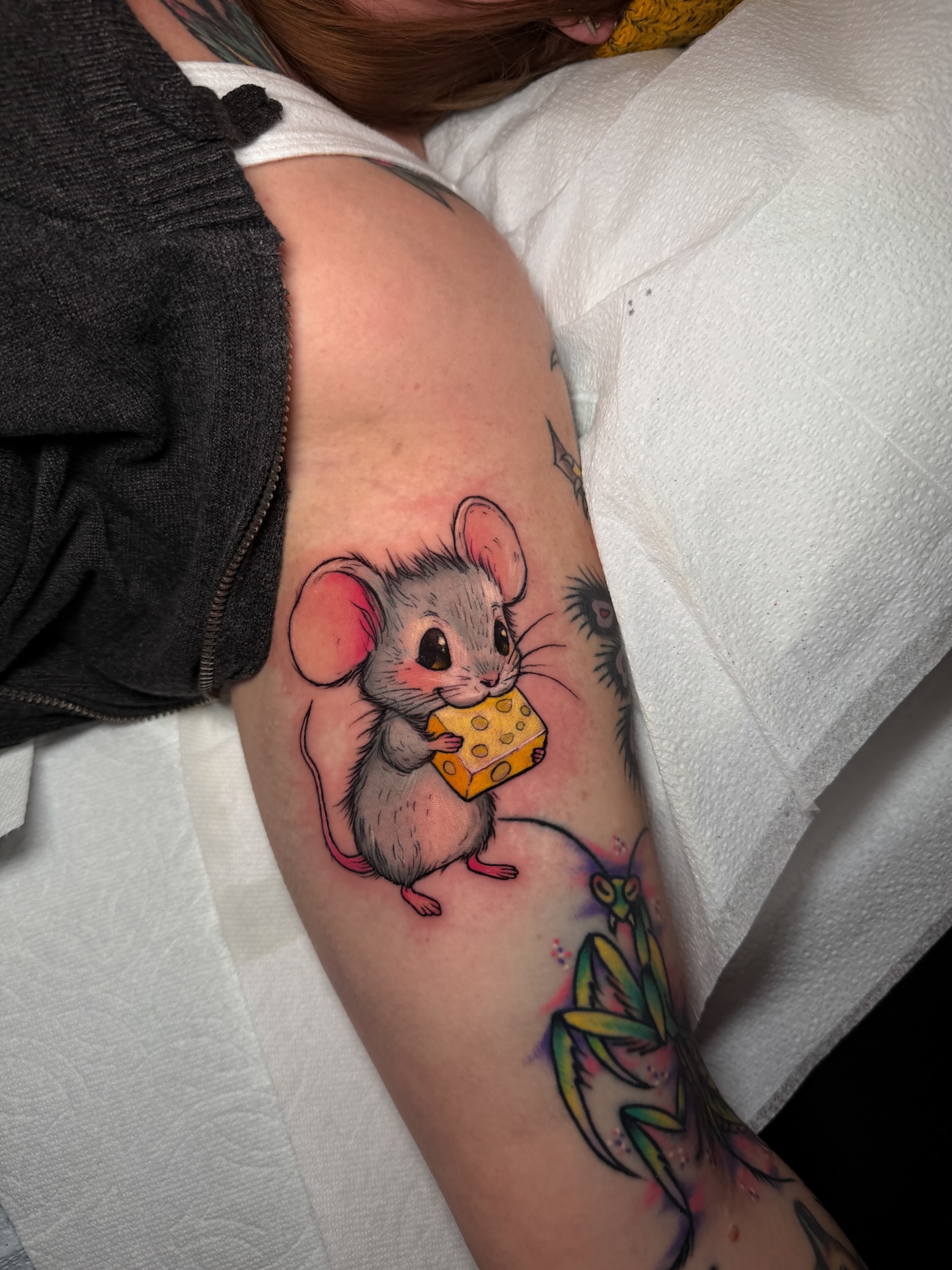 Mouse holding cheese realism tattoo on the forearm by Tattoo Artist Los Angeles